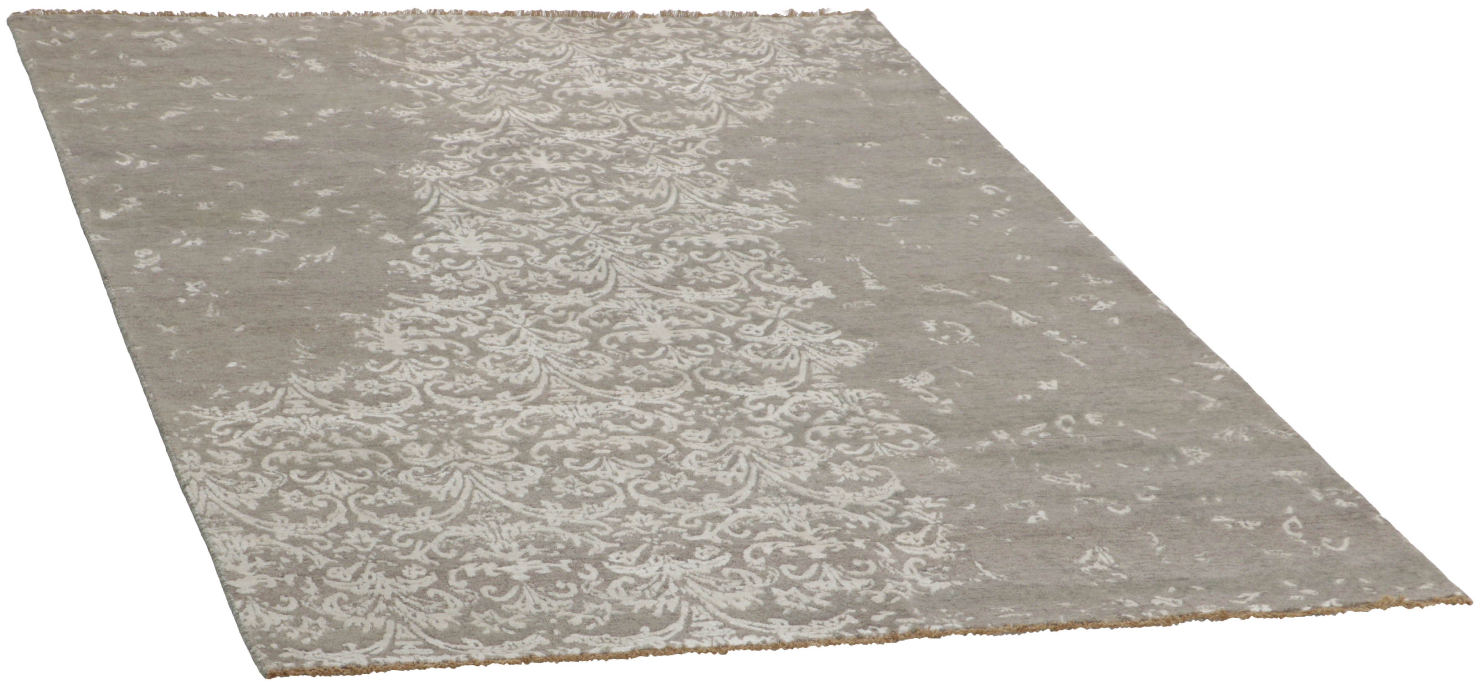 Authentic oriental rug with a damask pattern in beige