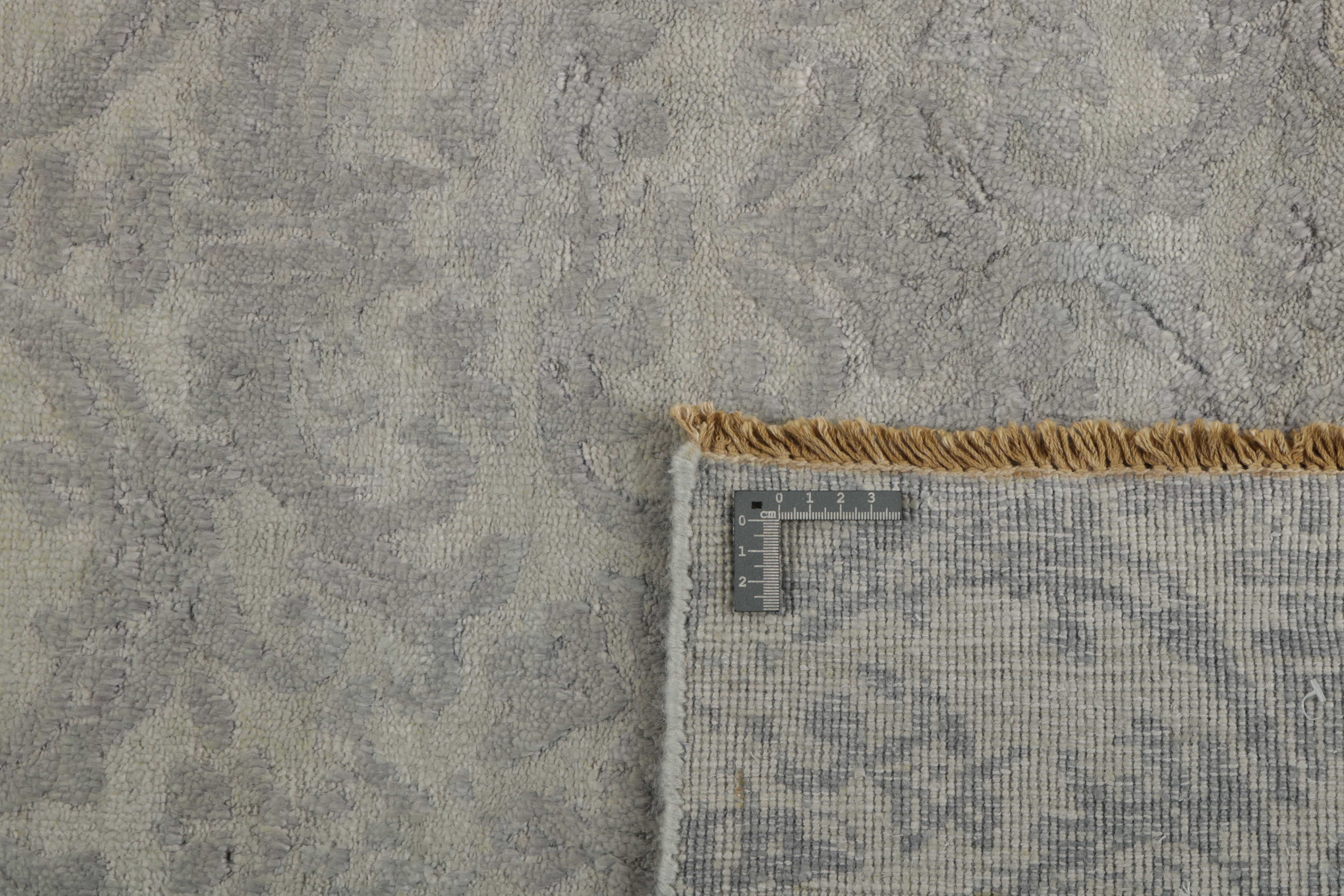 Authentic oriental rug with a damask pattern in beige