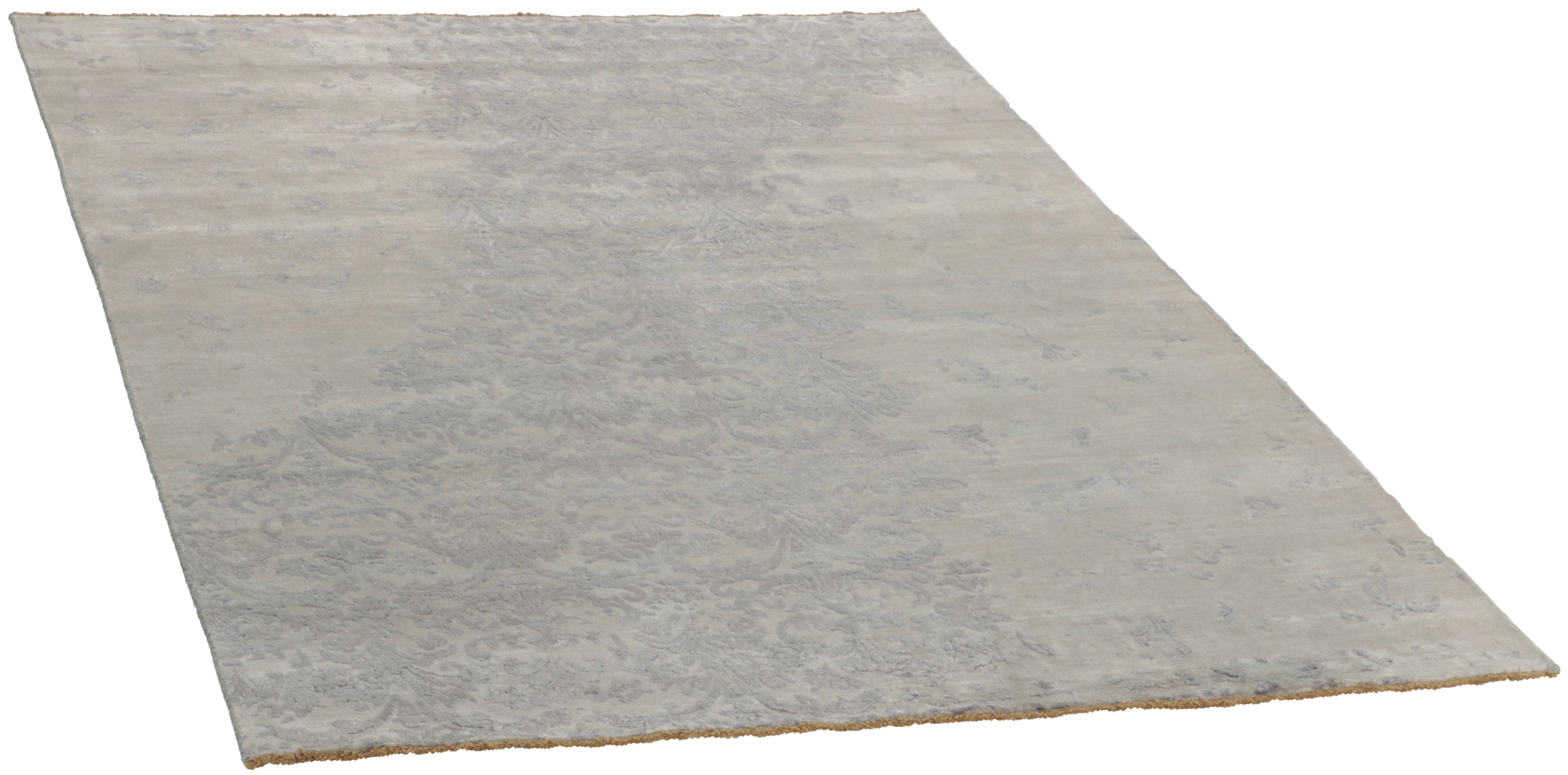 Authentic oriental rug with a damask pattern in beige