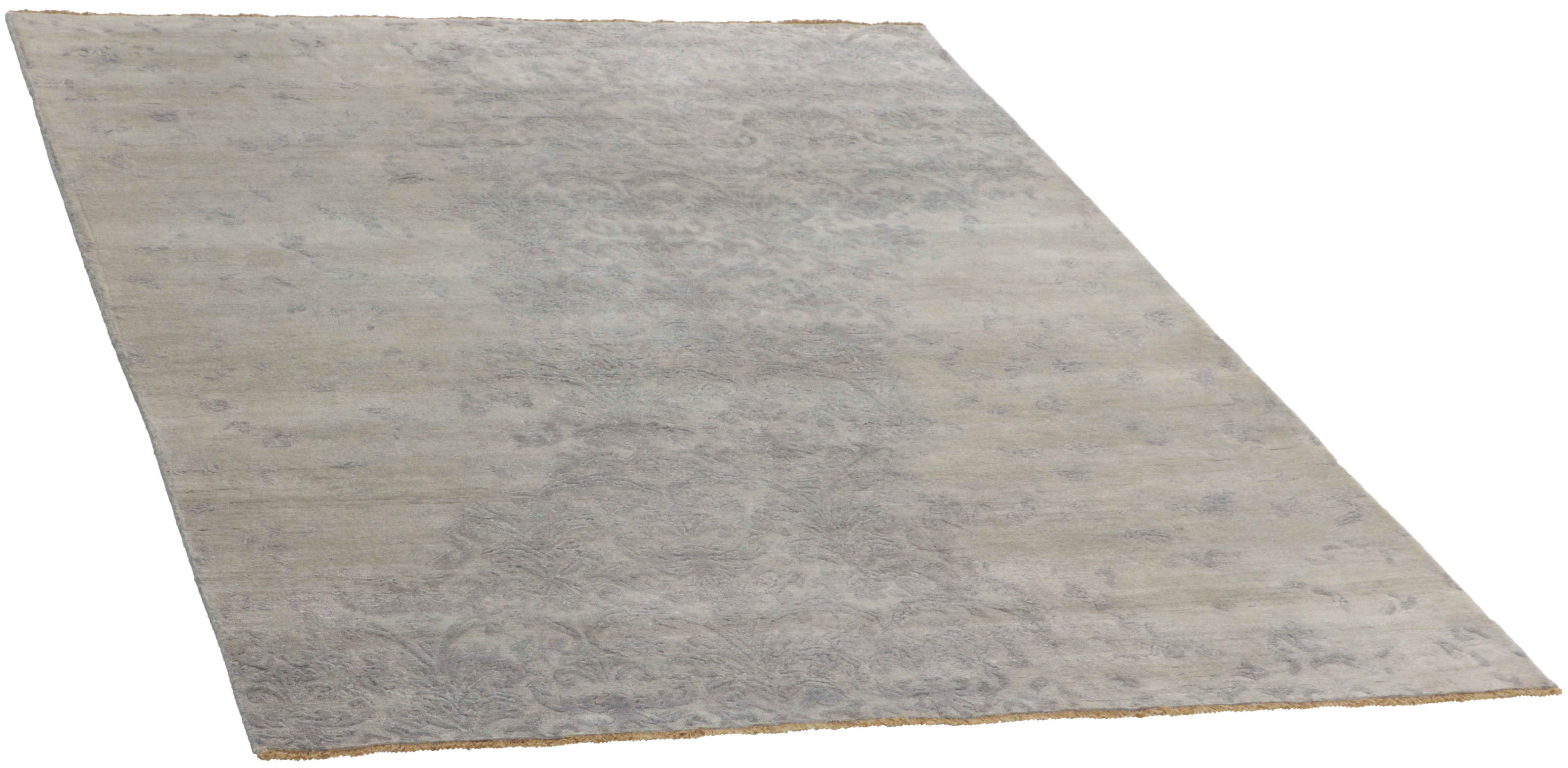 Authentic oriental rug with a damask pattern in beige