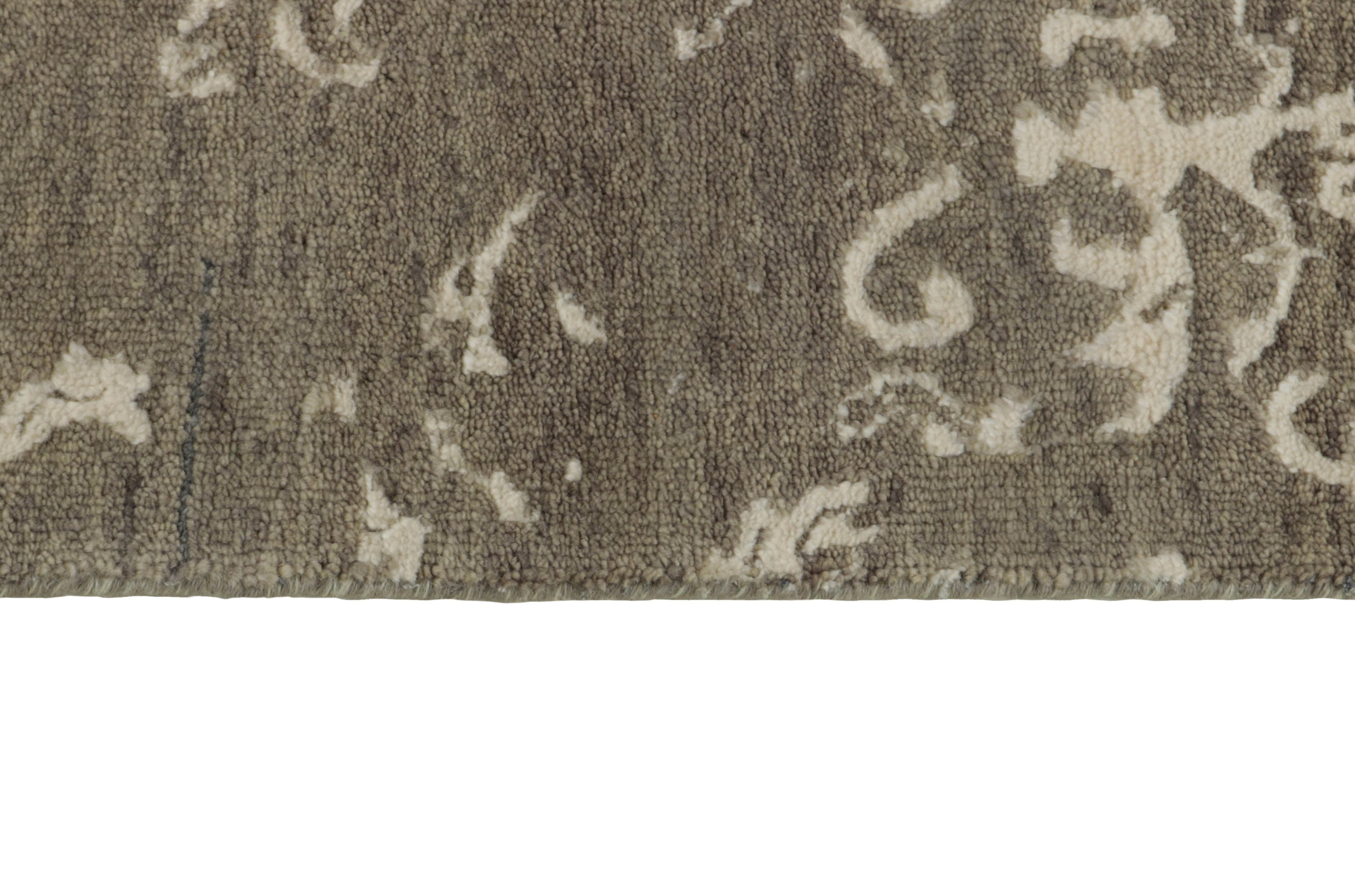 oriental rug with a beige damask pattern
