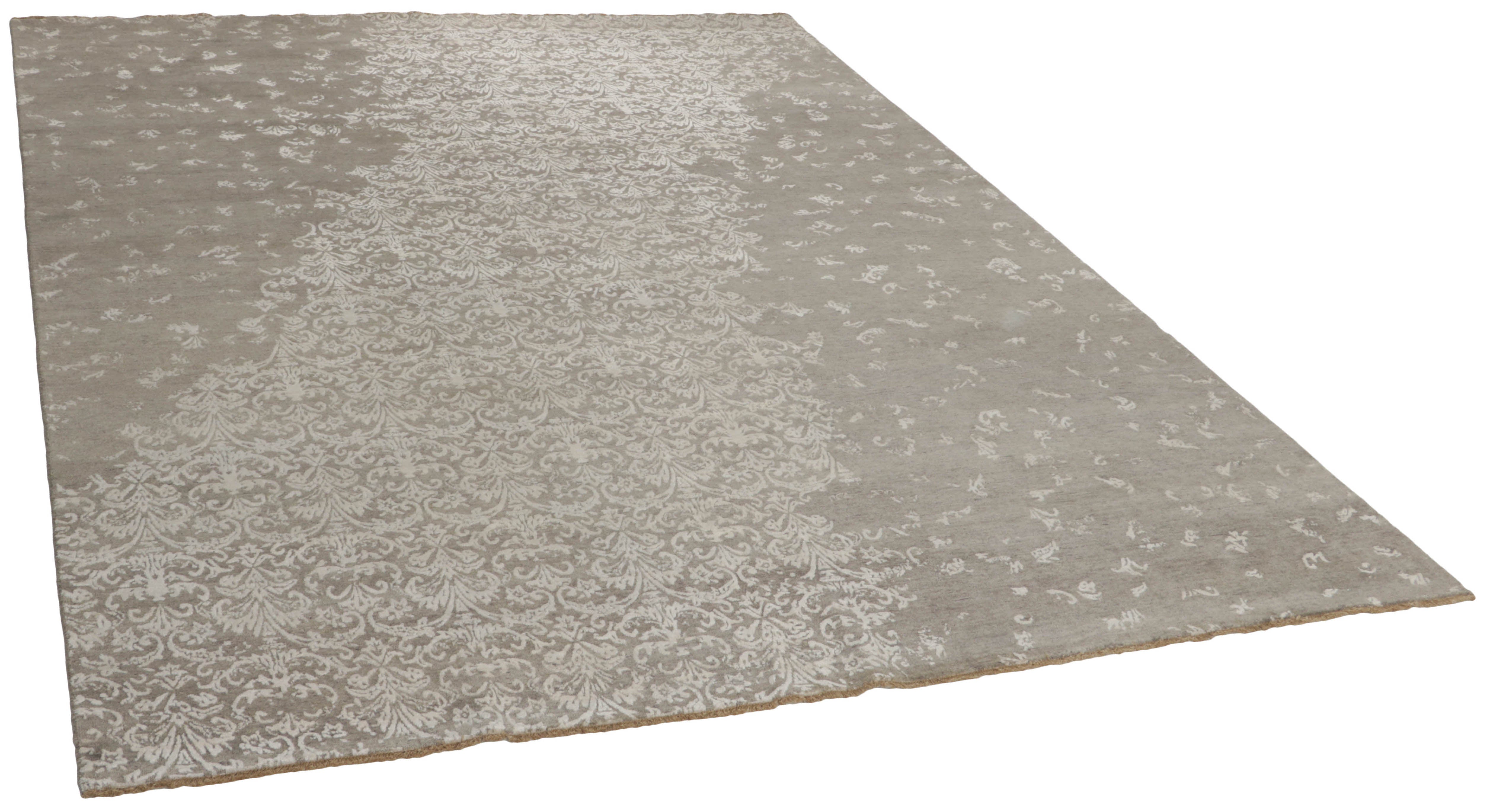Authentic oriental rug with a damask pattern in cream