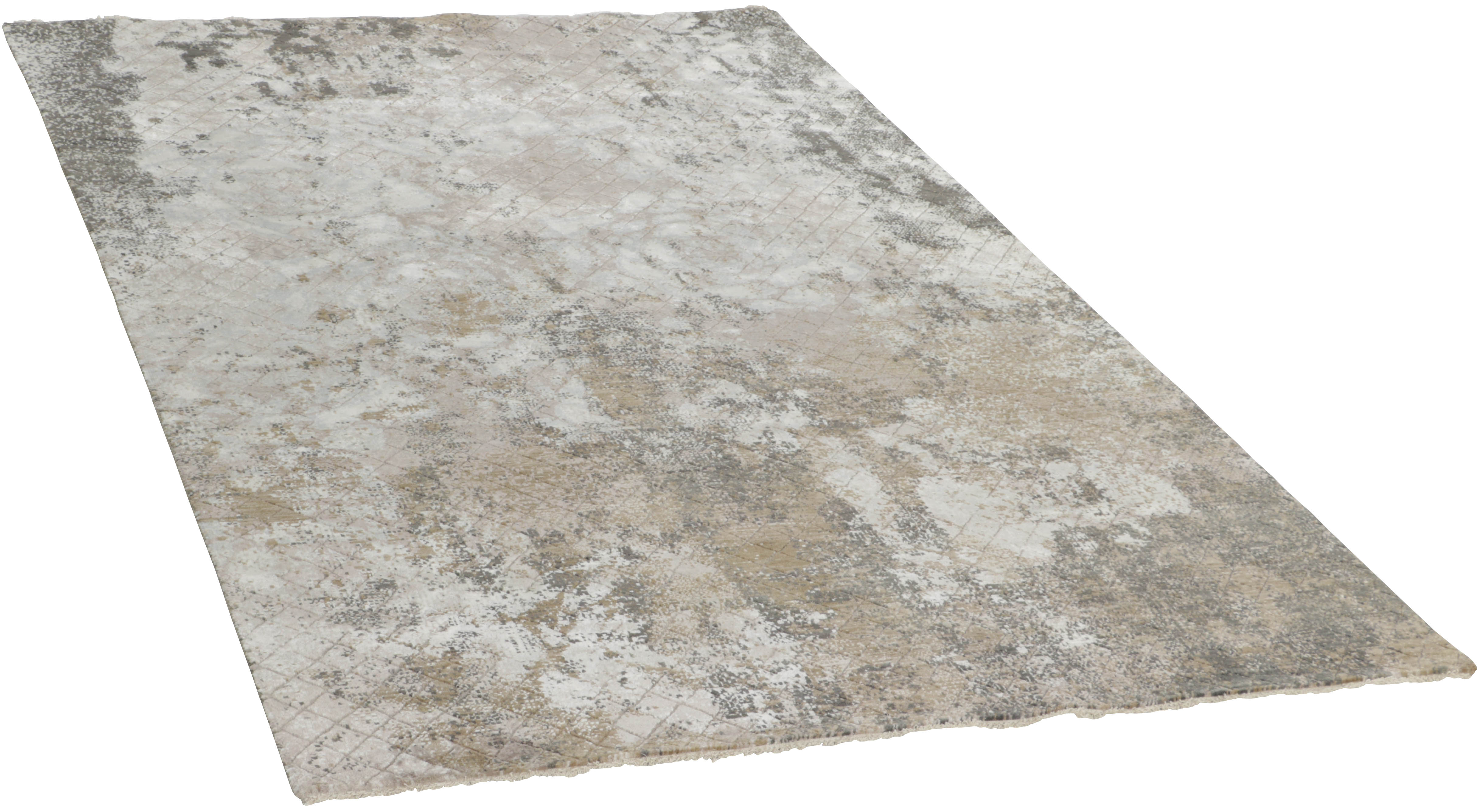 Large area rug with abstract floral design in grey and beige