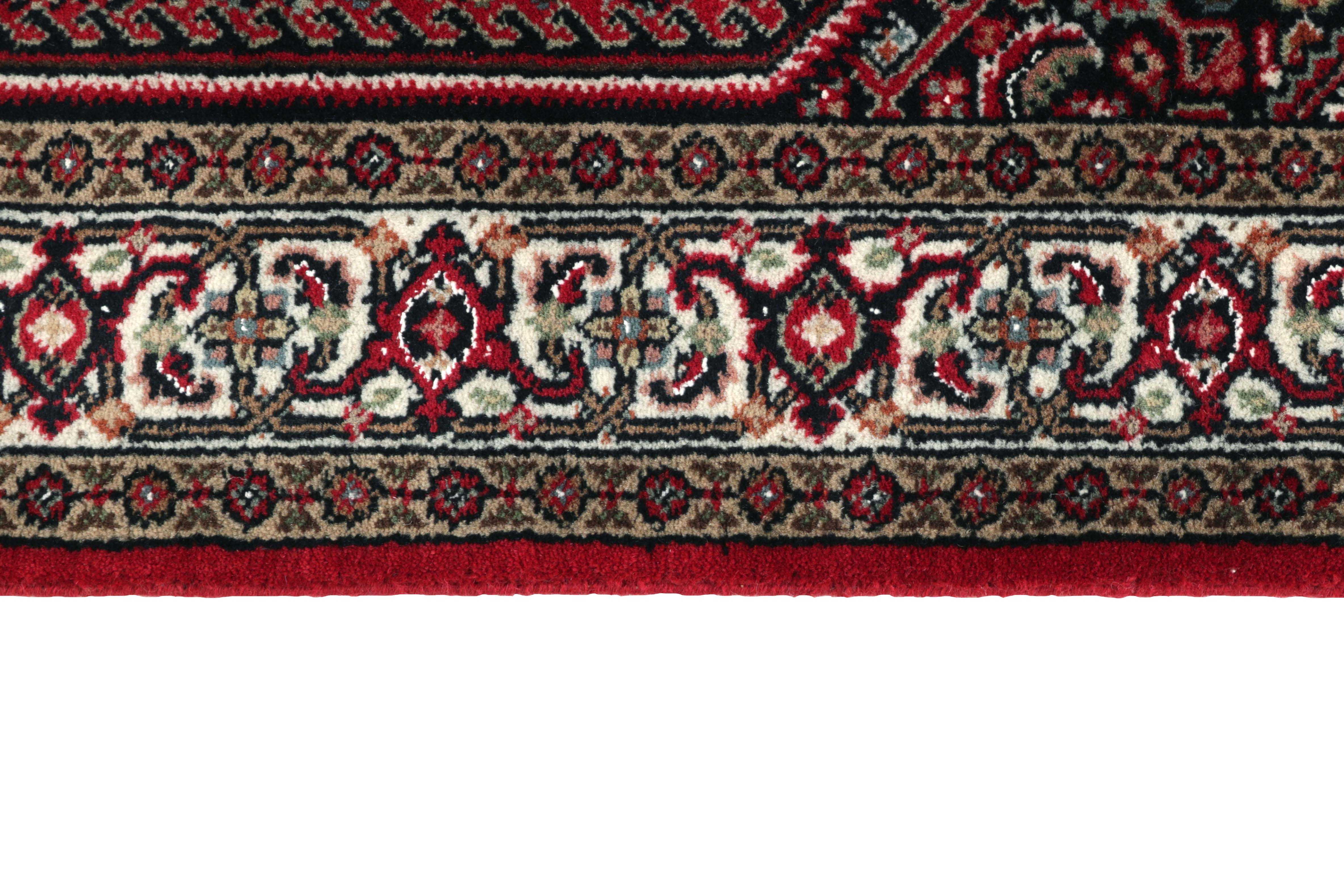 Authentic oriental rug with central medallion and traditional motifs in red