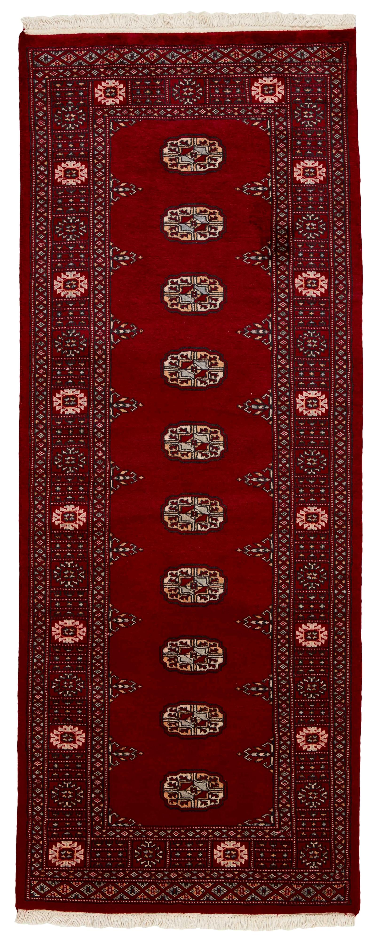 red oriental rug with traditional pattern