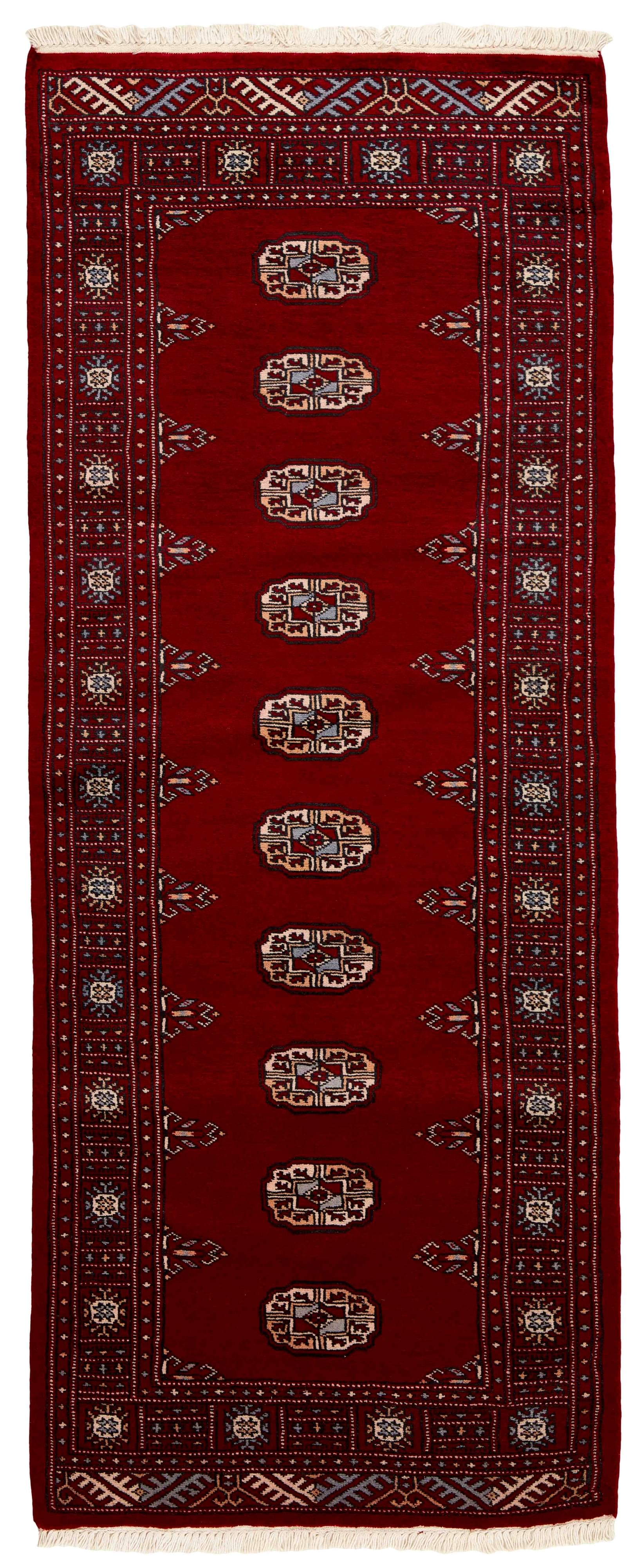 red oriental runner with traditional gul pattern