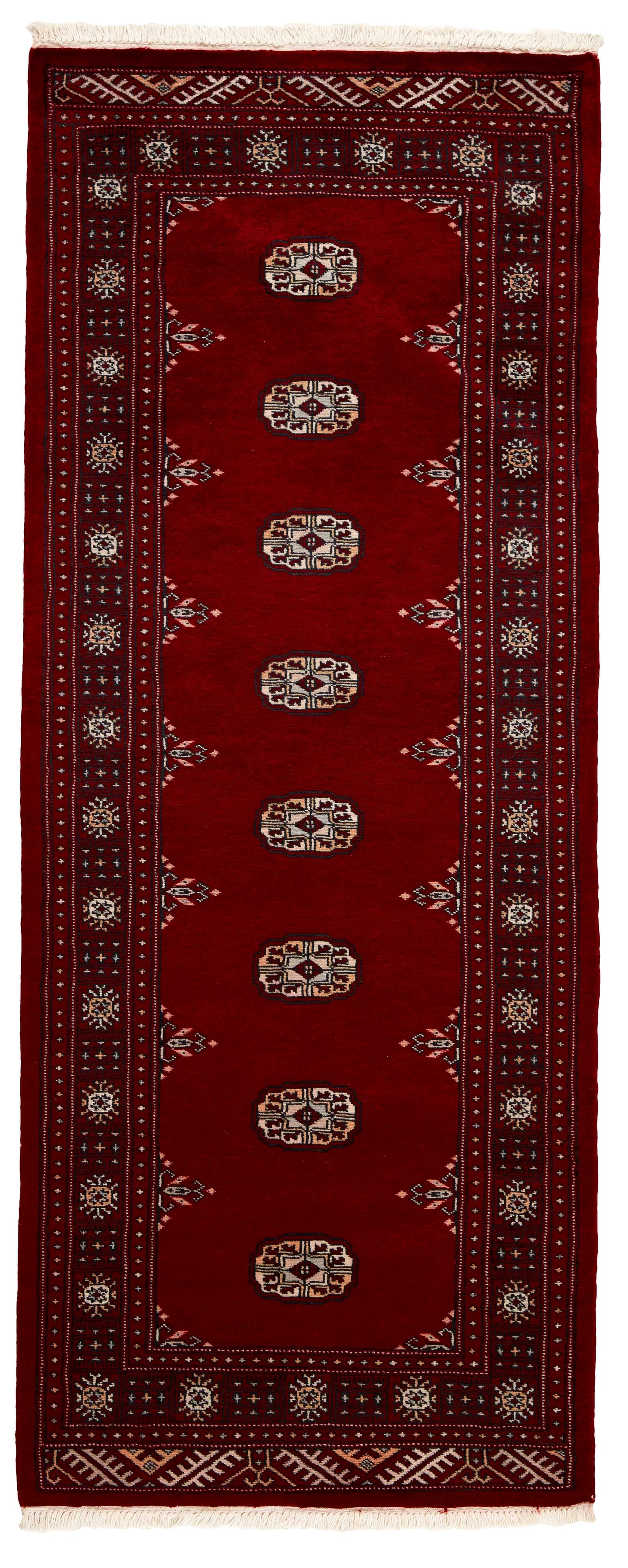 red oriental runner with traditional gul pattern