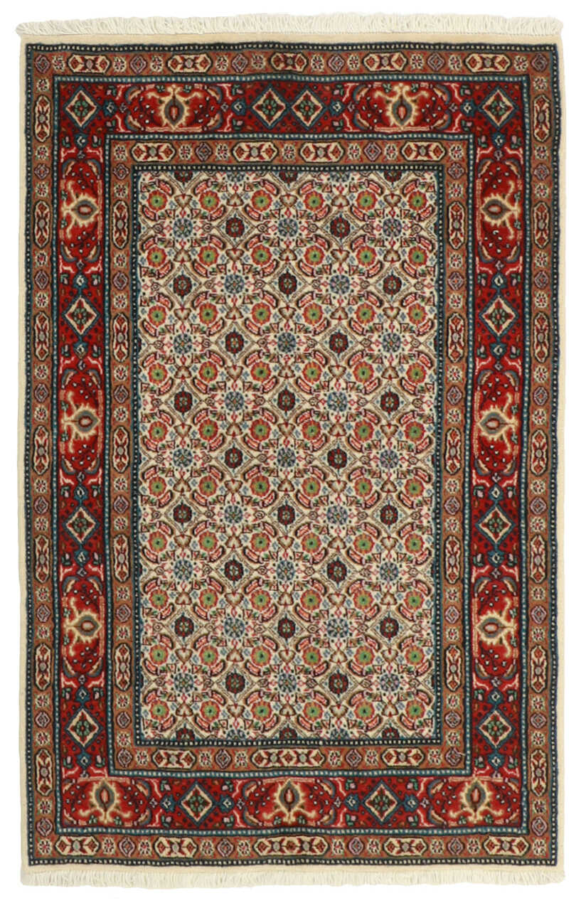 authentic persian rug with traditional floral pattern in beige, blue and red