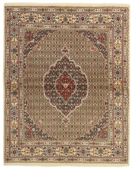 authentic persian rug with traditional floral pattern in cream, blue and red