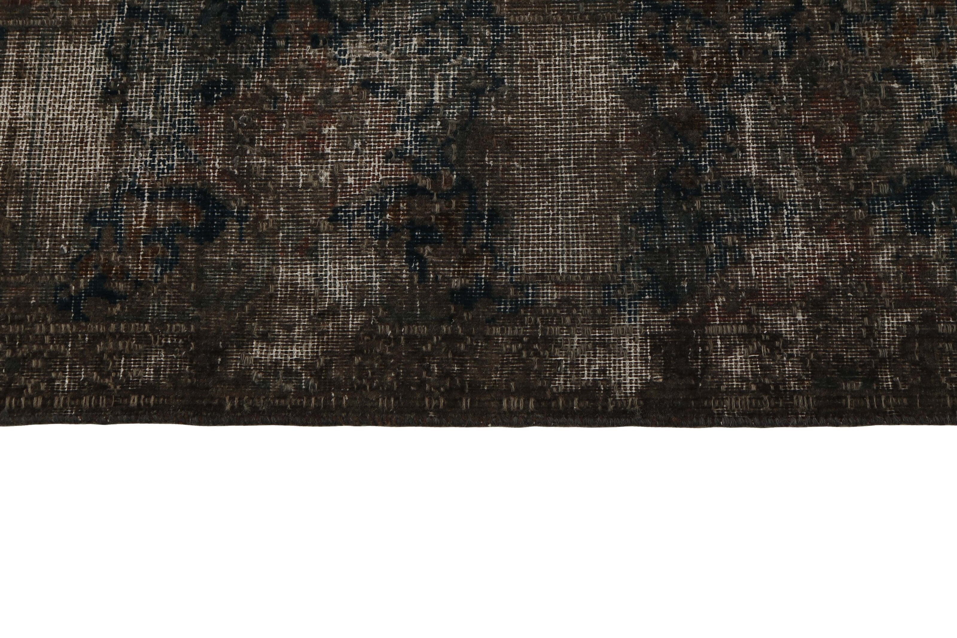 Black distressed bordered vintage Persian-style rug