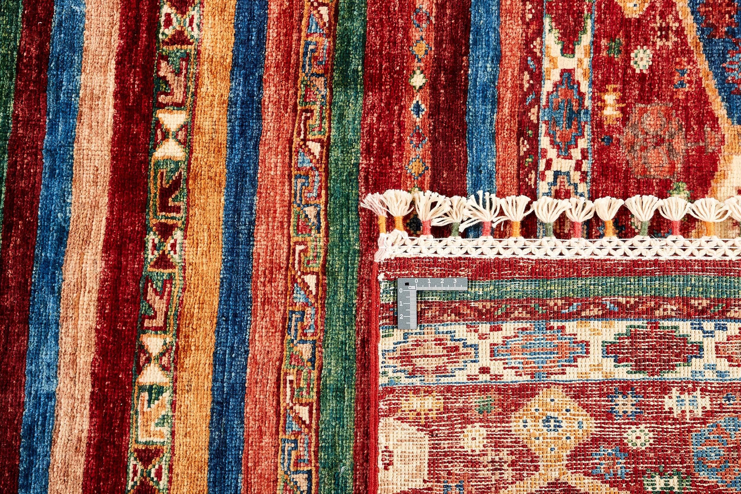 Authentic multicolour shall rug with traditional pattern