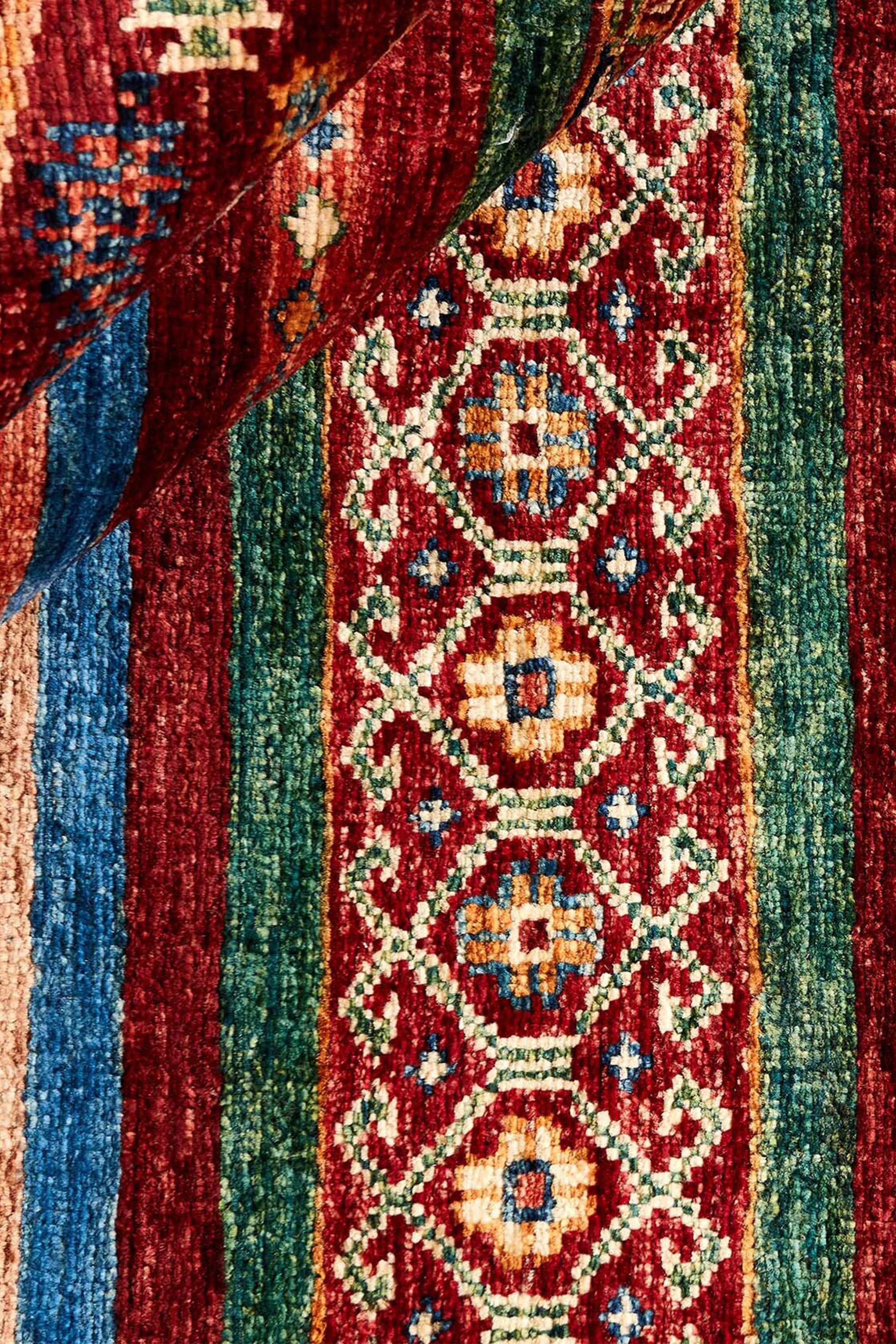 Authentic multicolour shall rug with traditional pattern