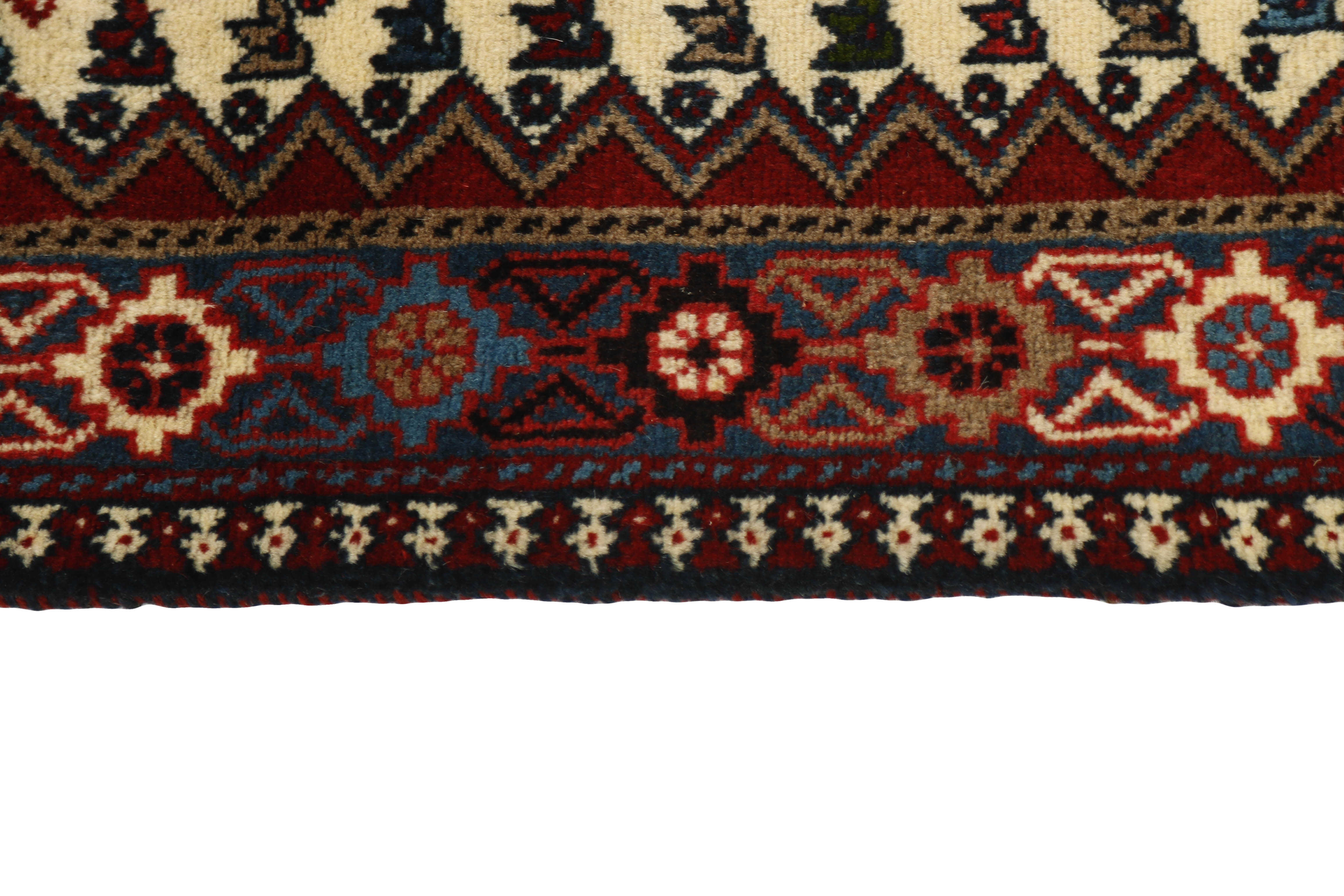 red authentic persian rug with a traditional design