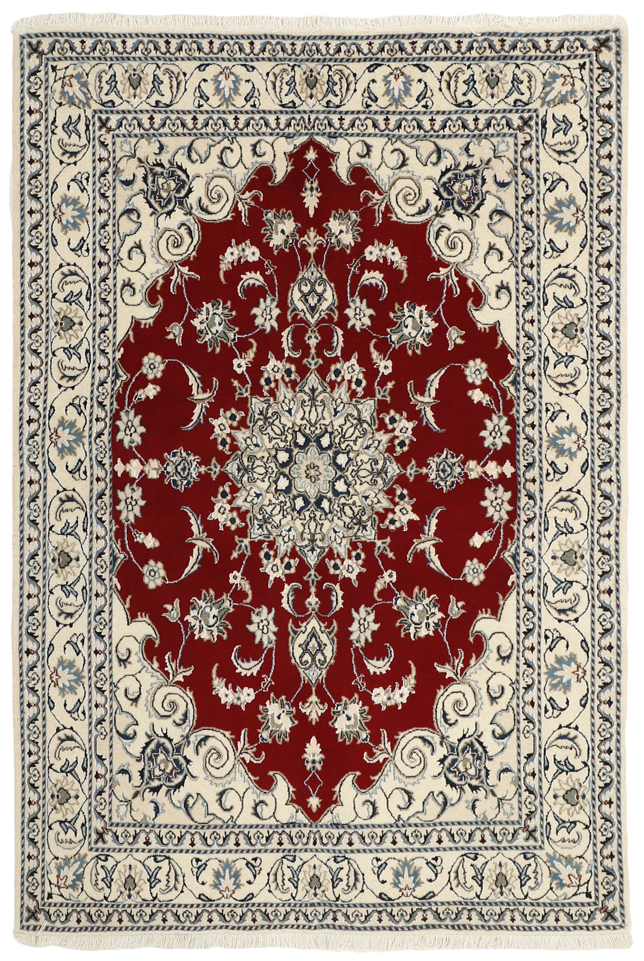 Authentic persian rug with a traditional floral design in cream and red