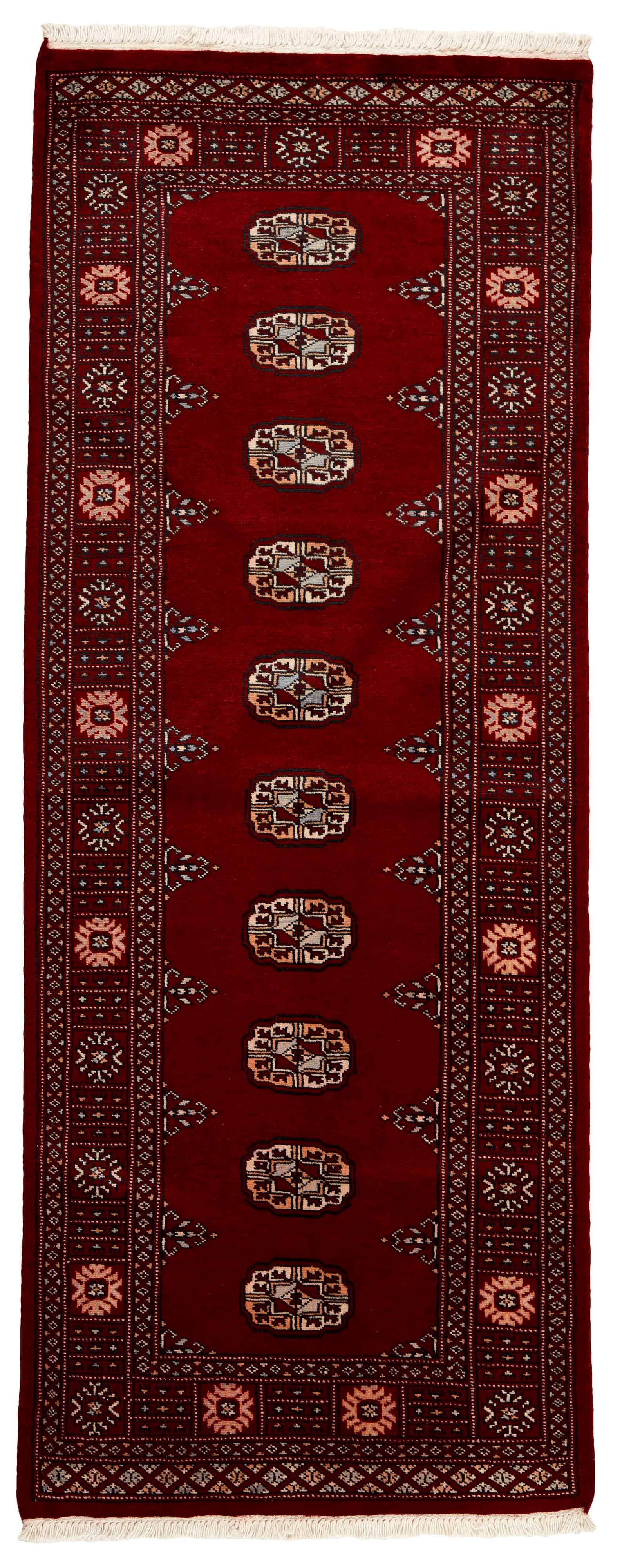red oriental runner with traditional gul pattern