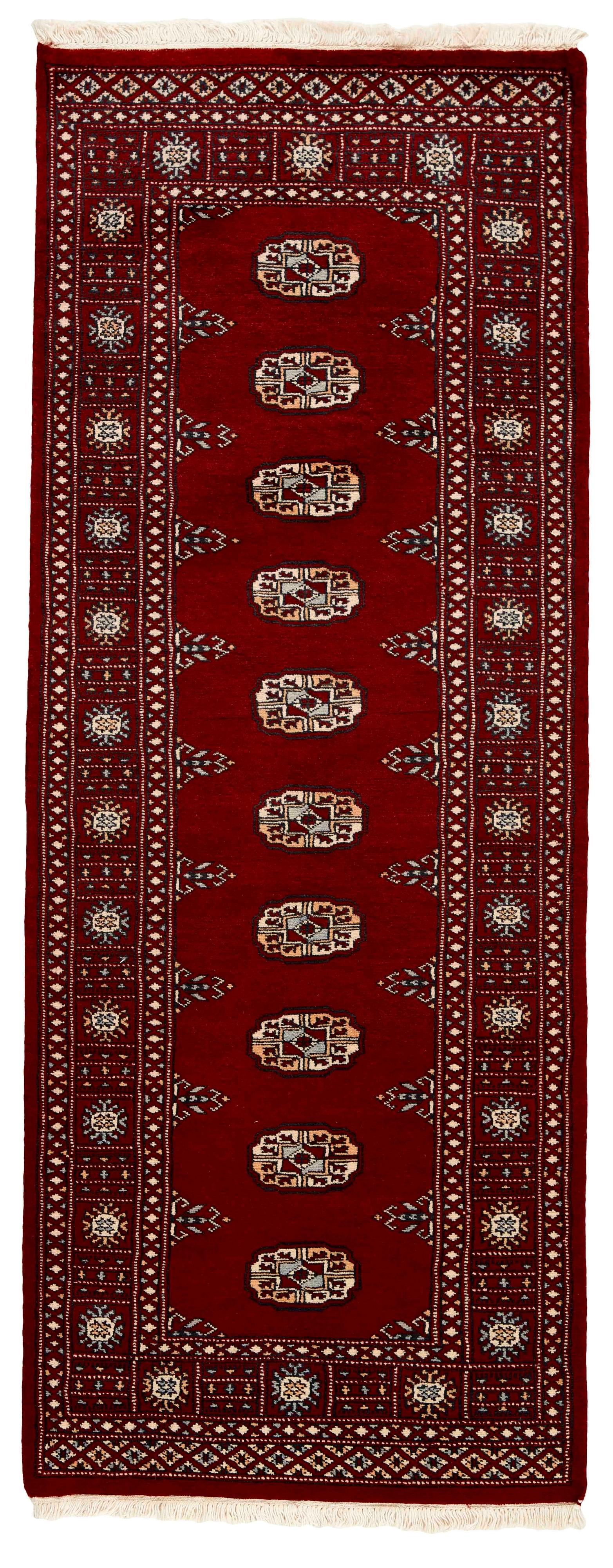 red oriental runner with traditional gul pattern
