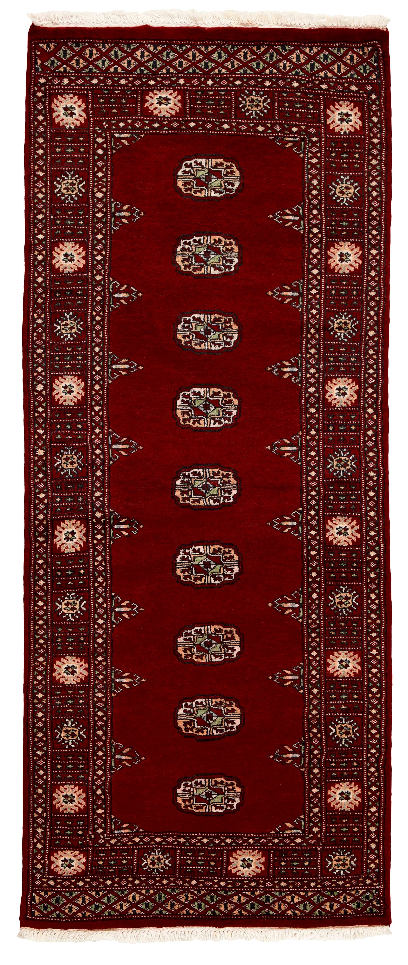 red oriental rug with traditional pattern