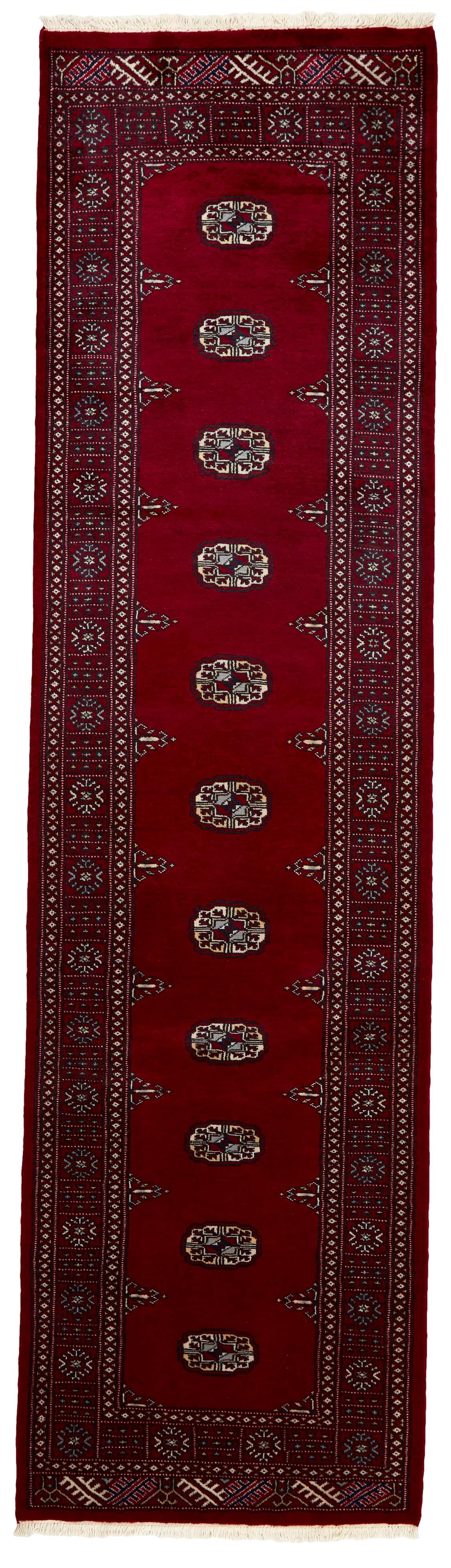 red oriental runner with traditional gul pattern