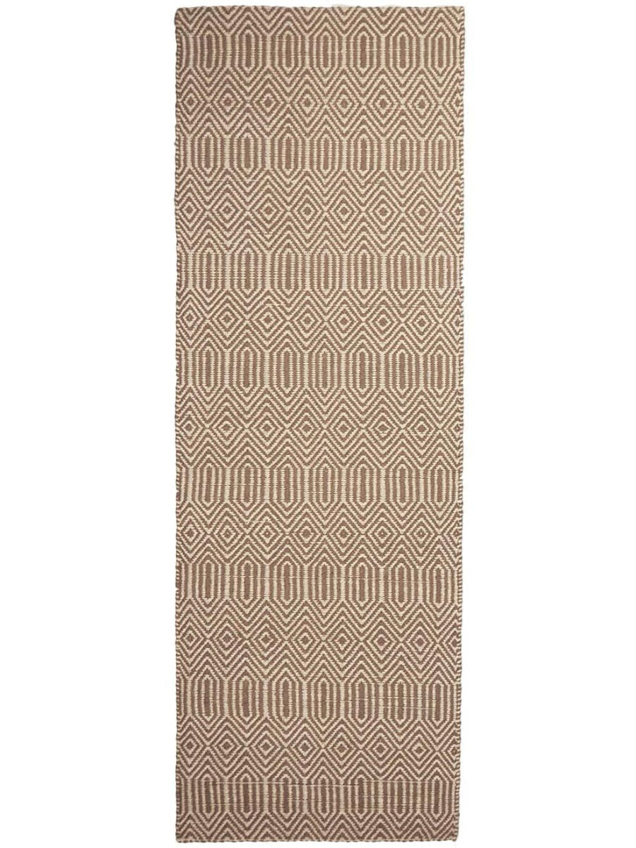taupe and white runner with a geometric aztec pattern