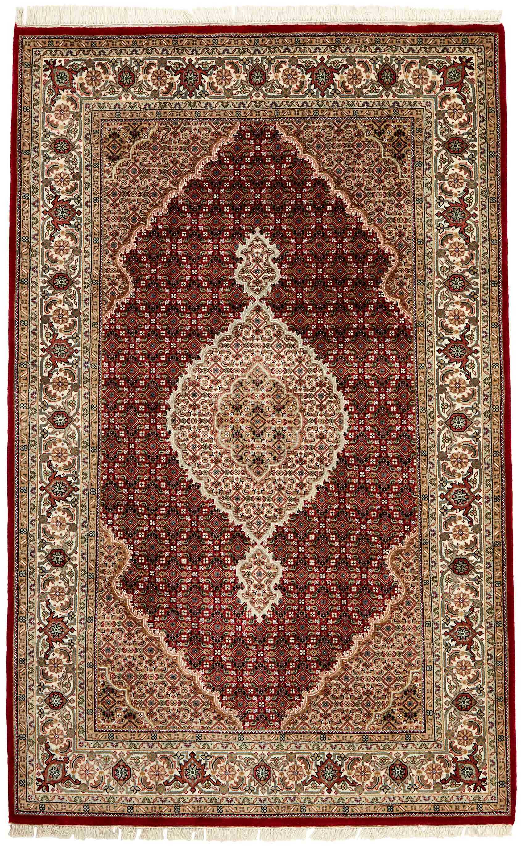 Authentic Oriental rug with traditional geometric and floral design in red