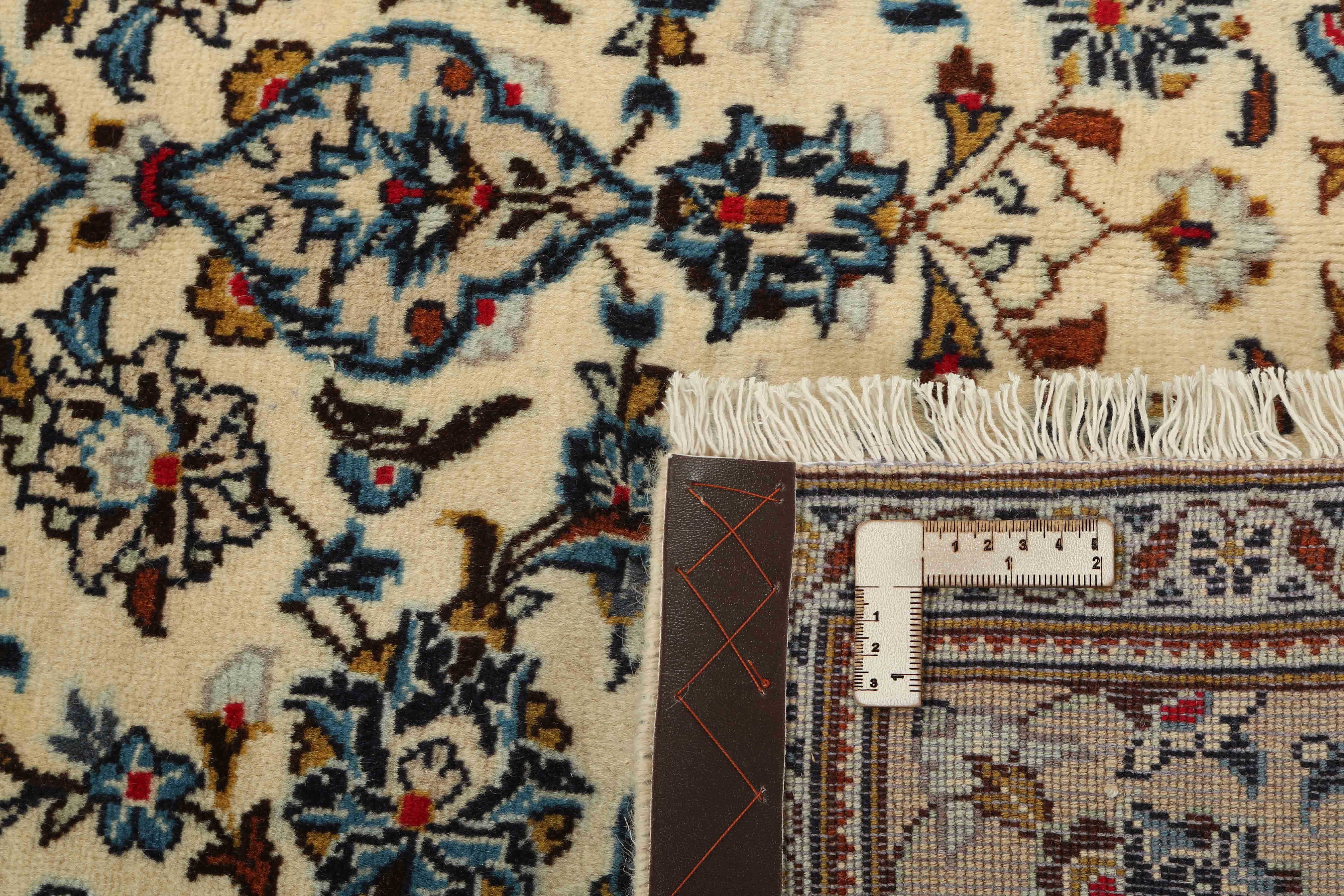 Authentic persian rug with traditional floral design in beige and blue