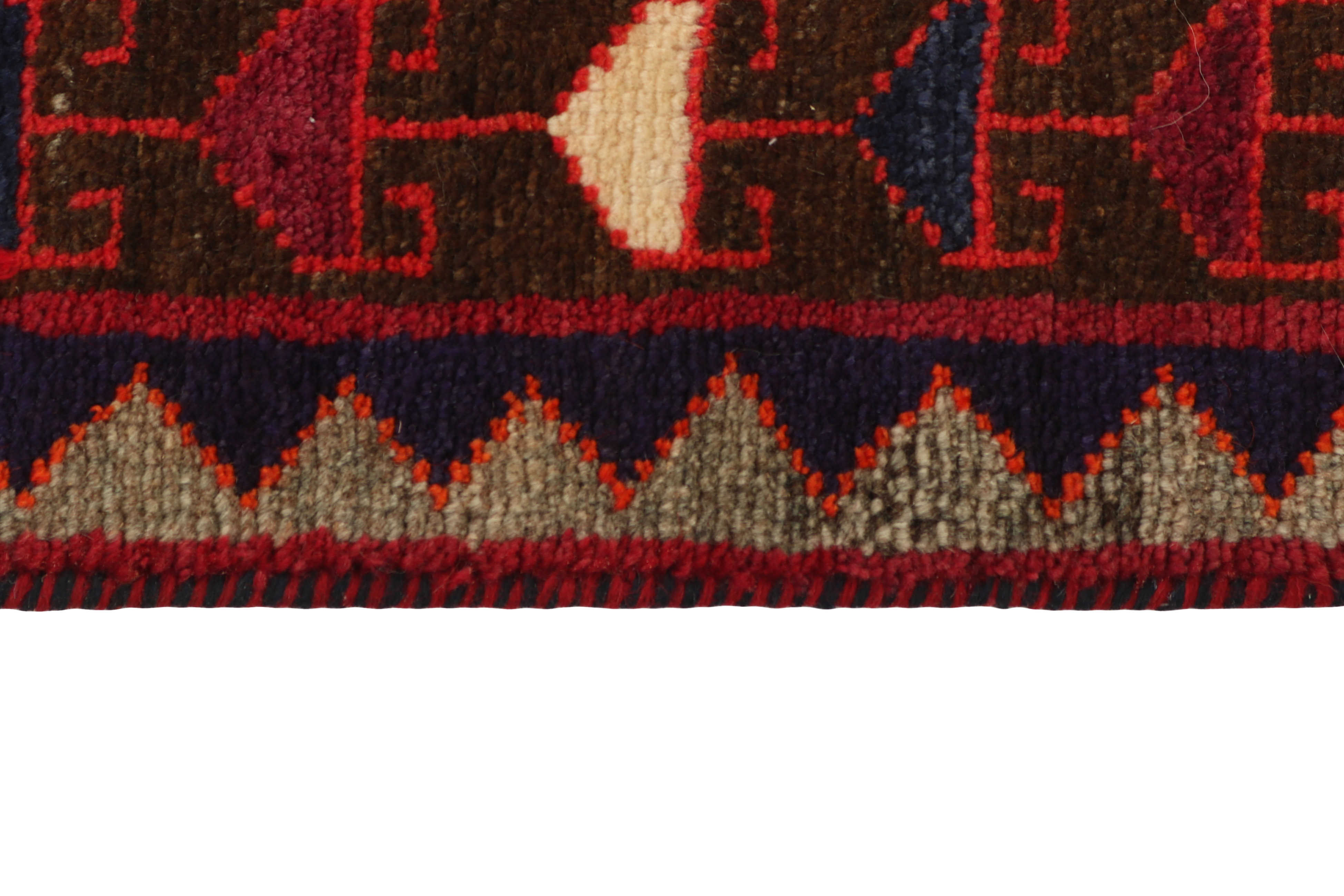 Red and white persian rug with traditional tribal geometric pattern