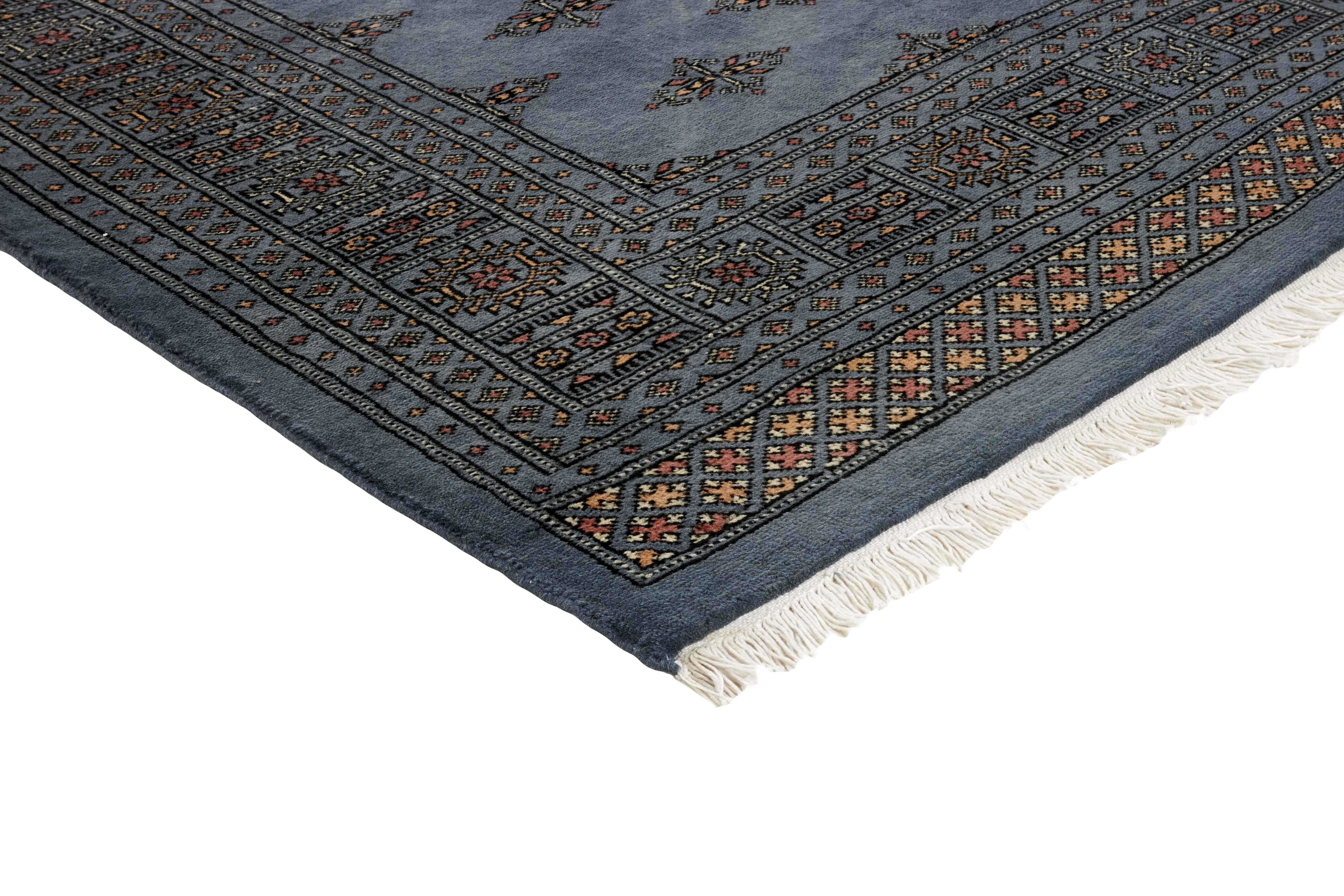 blue oriental rug with traditional pattern