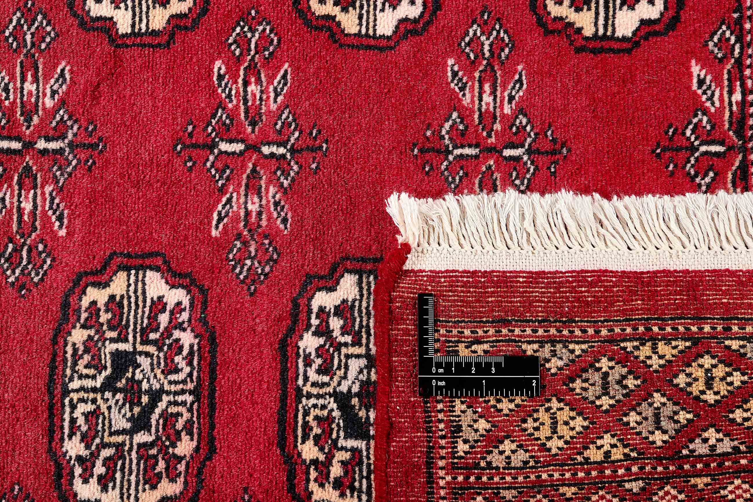 red oriental rug with traditional pattern