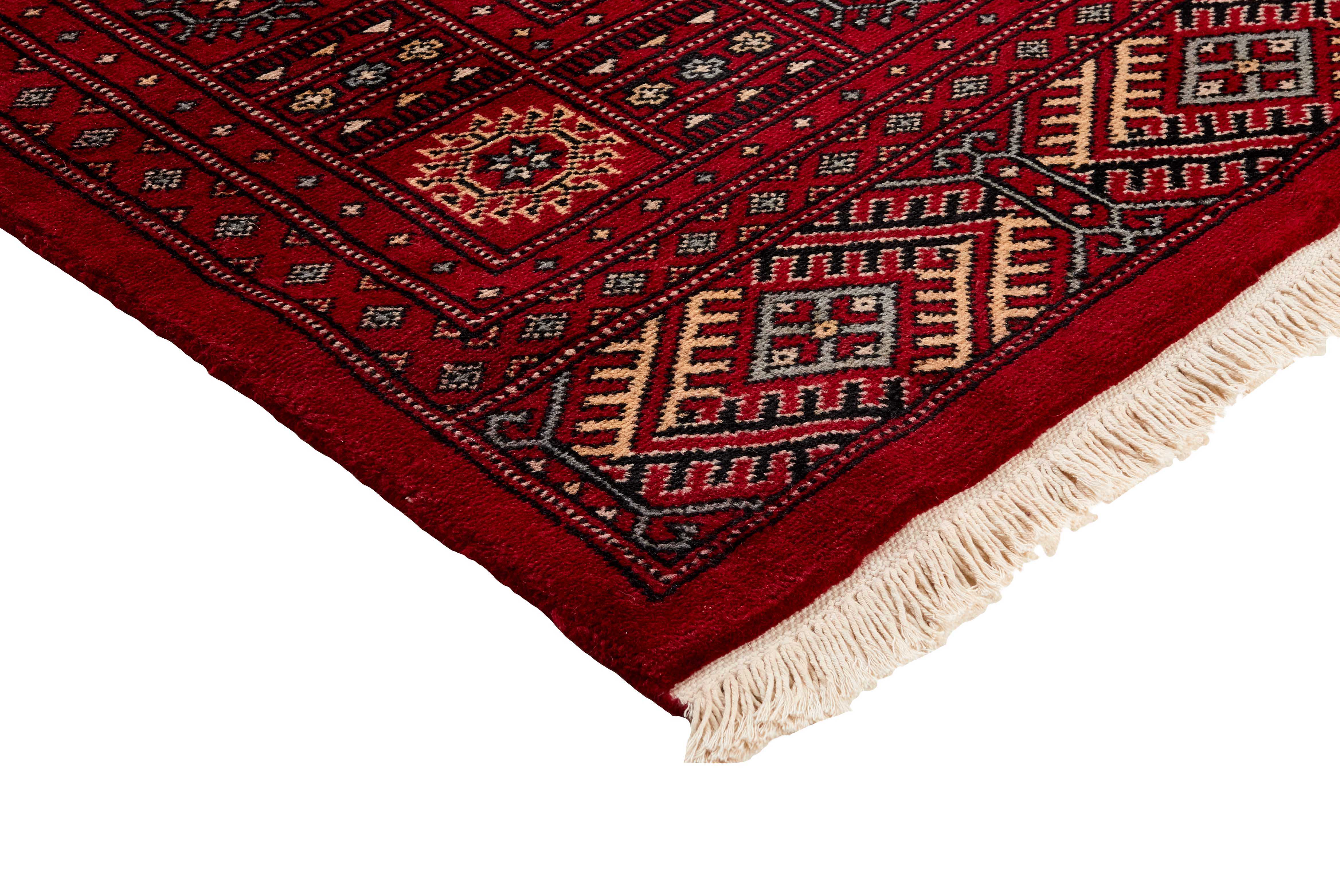 red oriental rug with traditional pattern