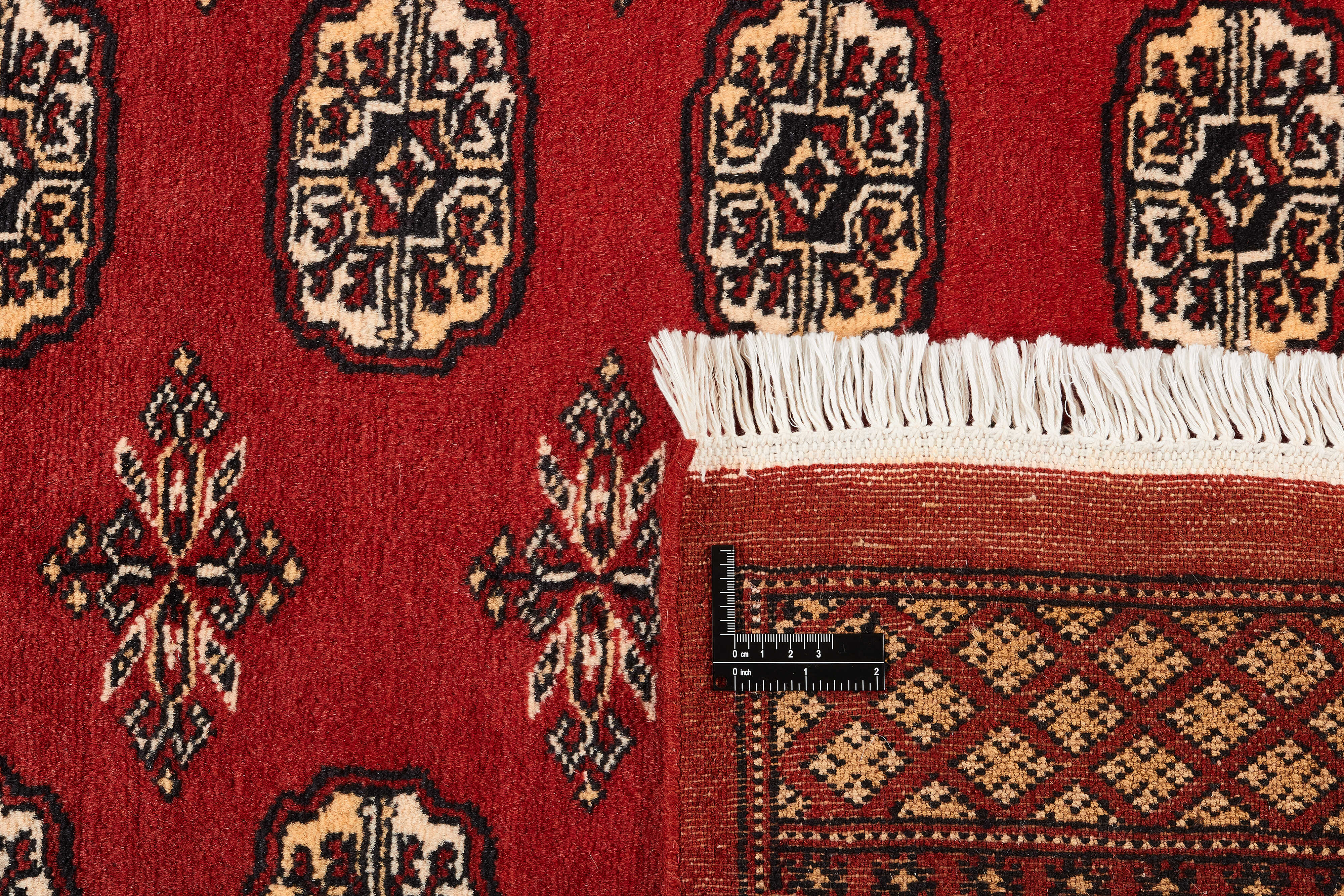 red oriental rug with traditional pattern
