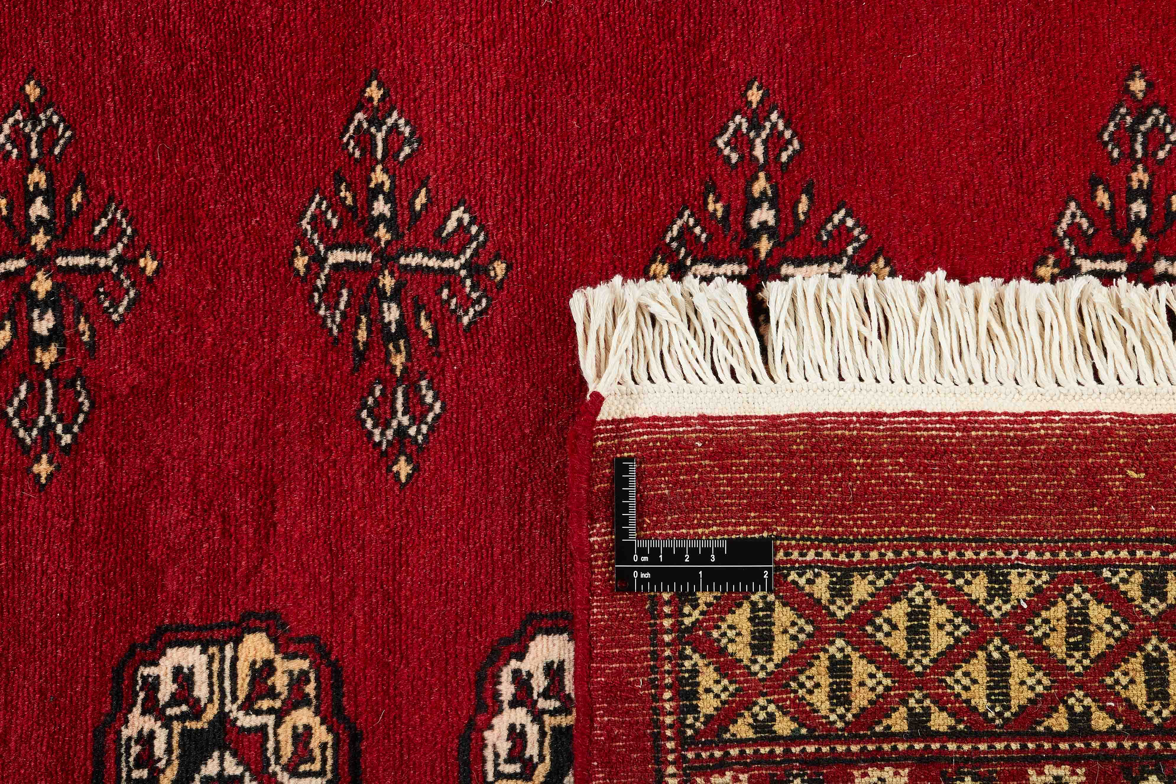 red oriental rug with traditional pattern