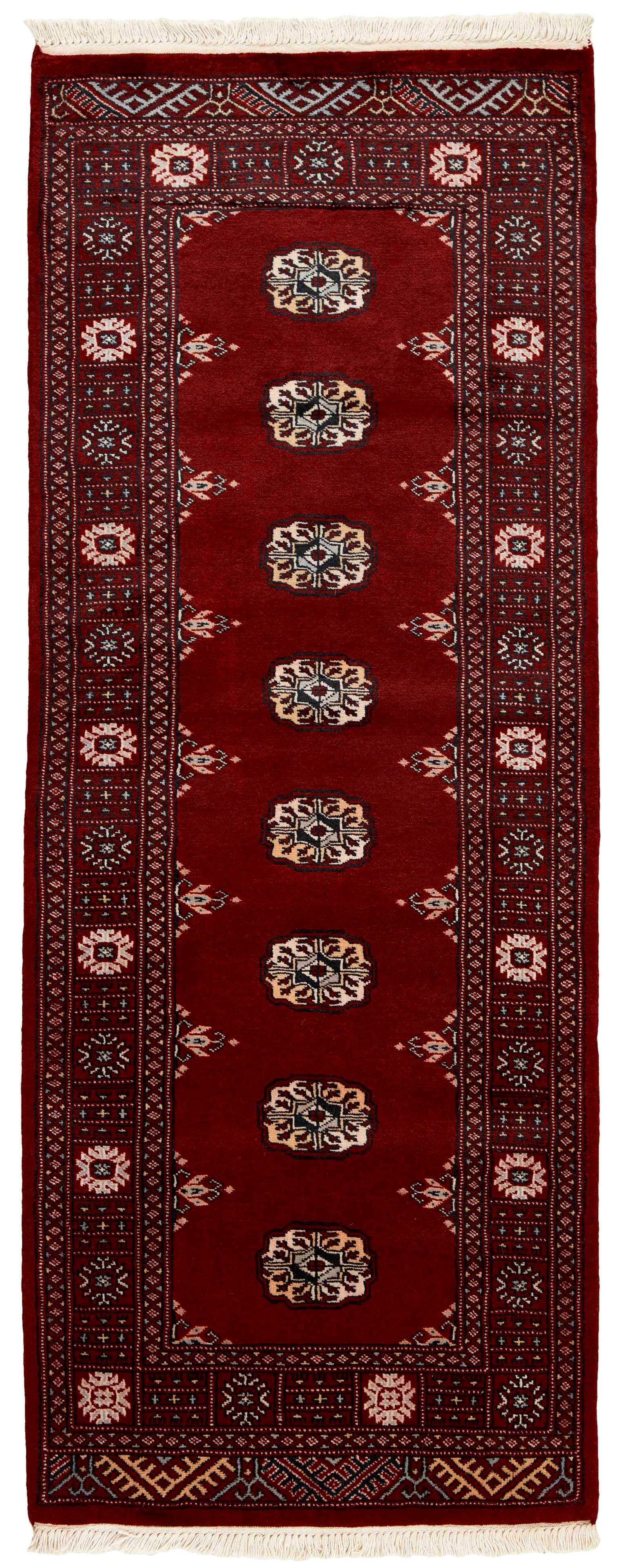 red oriental runner with traditional gul pattern