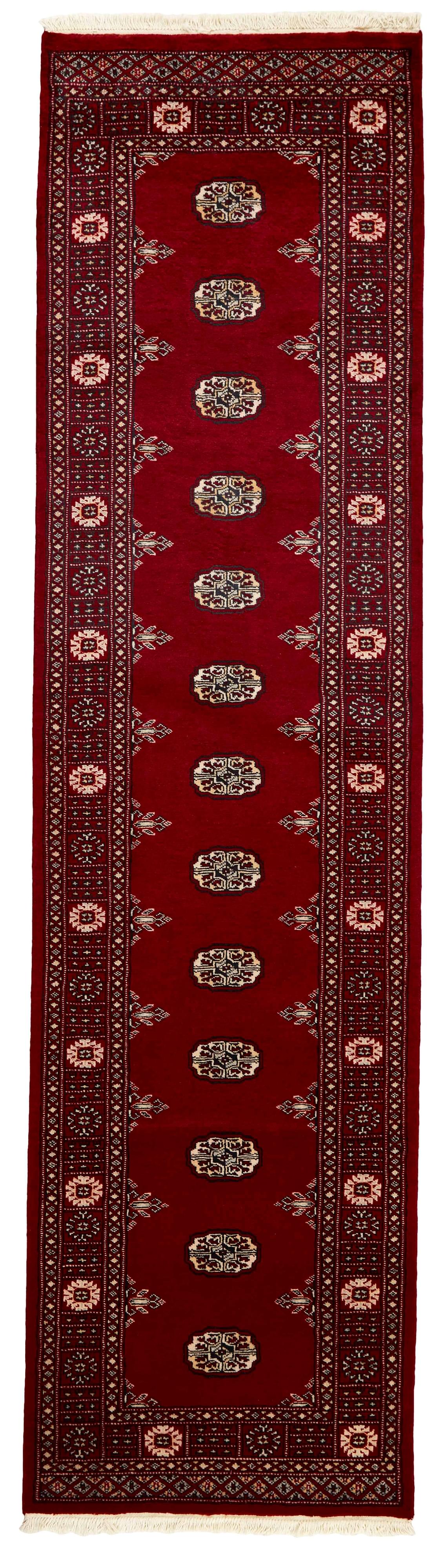 red oriental runner with traditional gul pattern