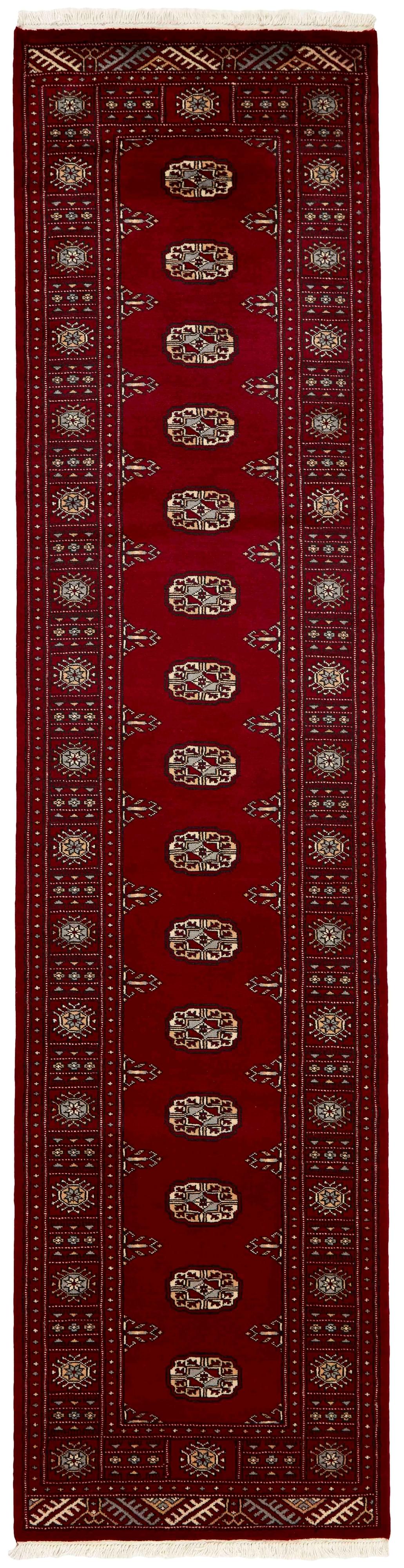 red oriental runner with traditional gul pattern