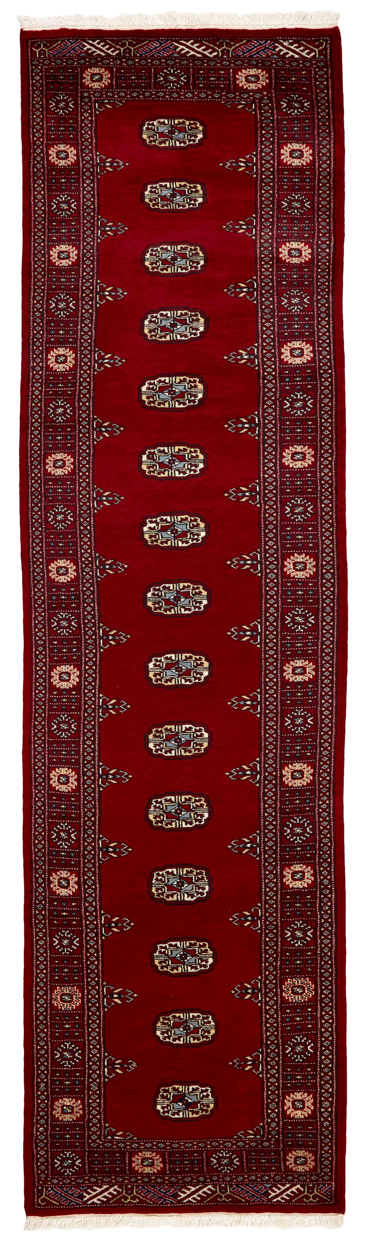 red oriental runner with traditional gul pattern