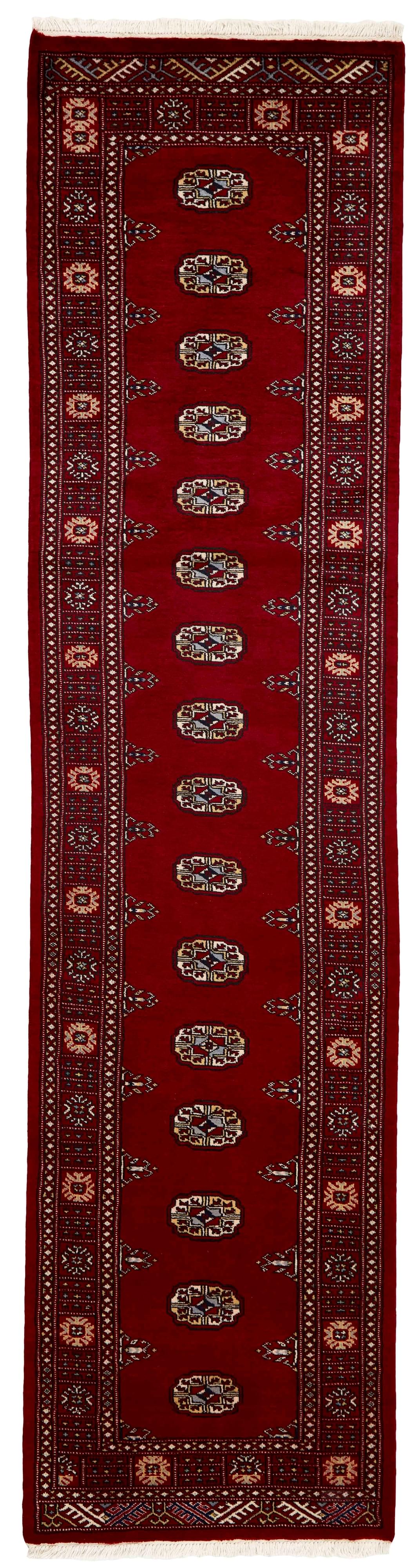 red oriental runner with traditional gul pattern