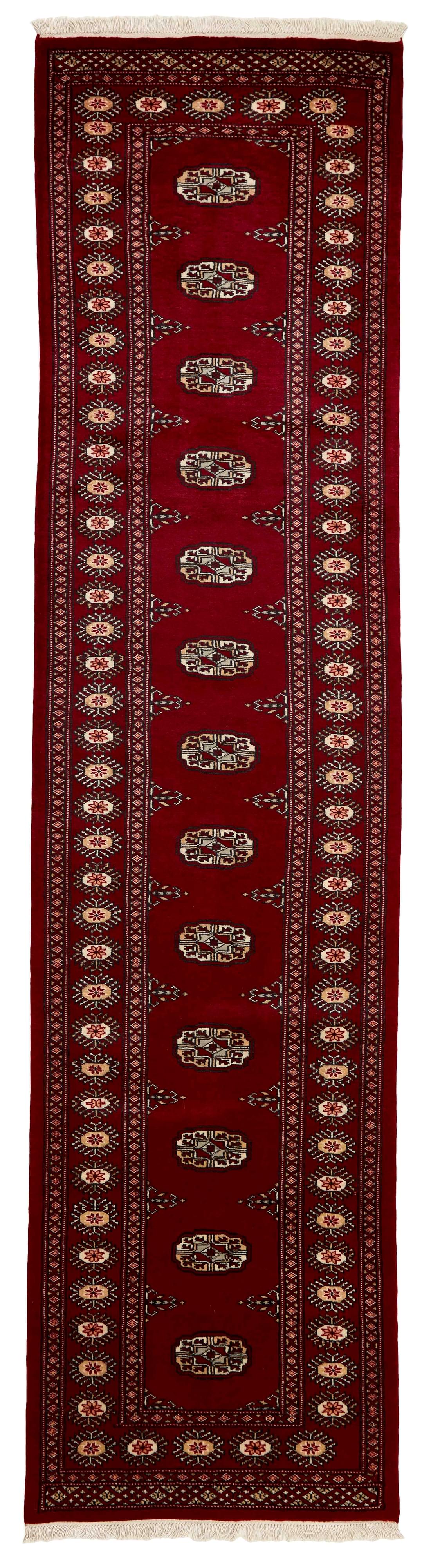 red oriental runner with traditional gul pattern