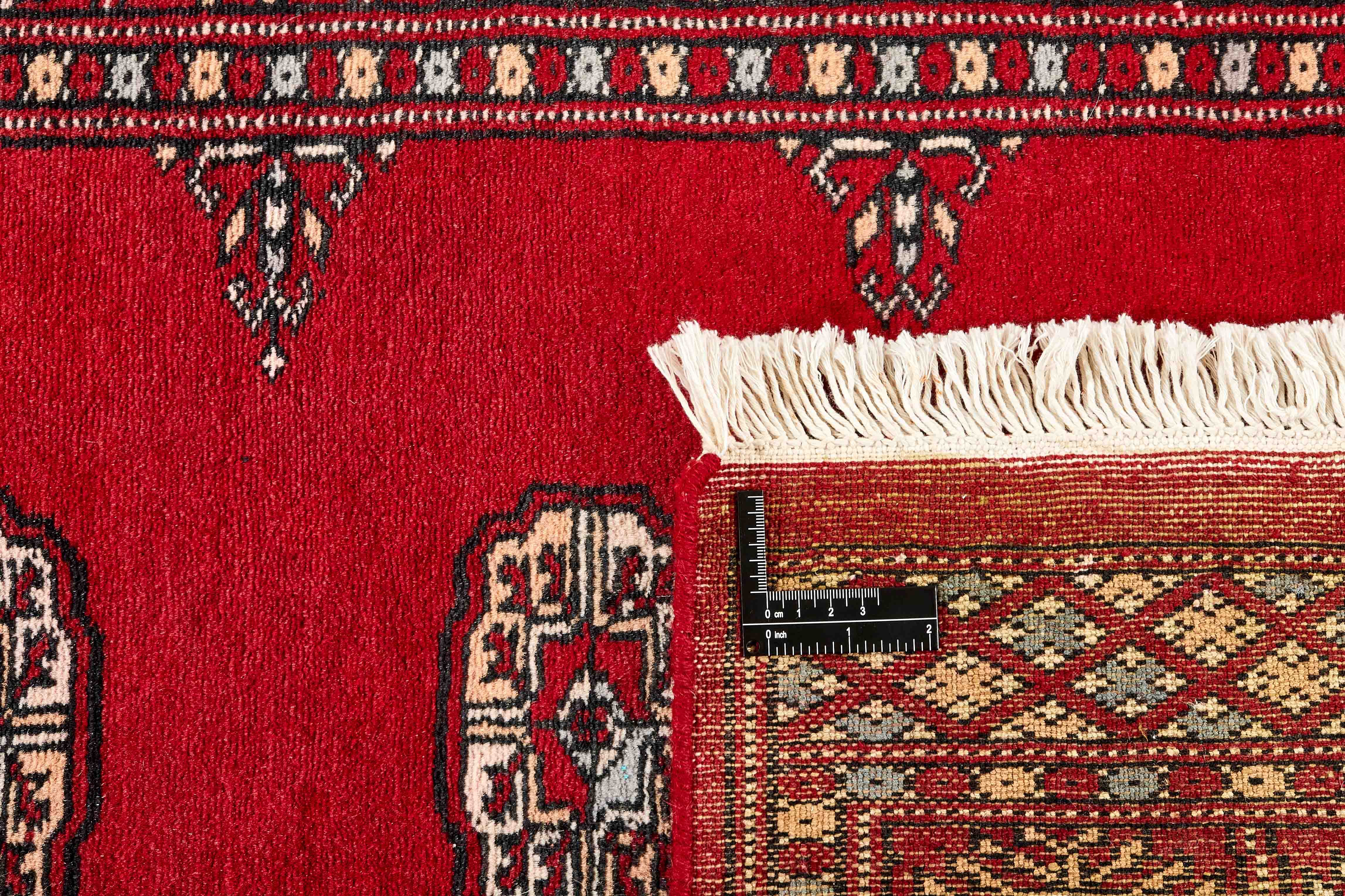 black oriental runner with traditional gul pattern