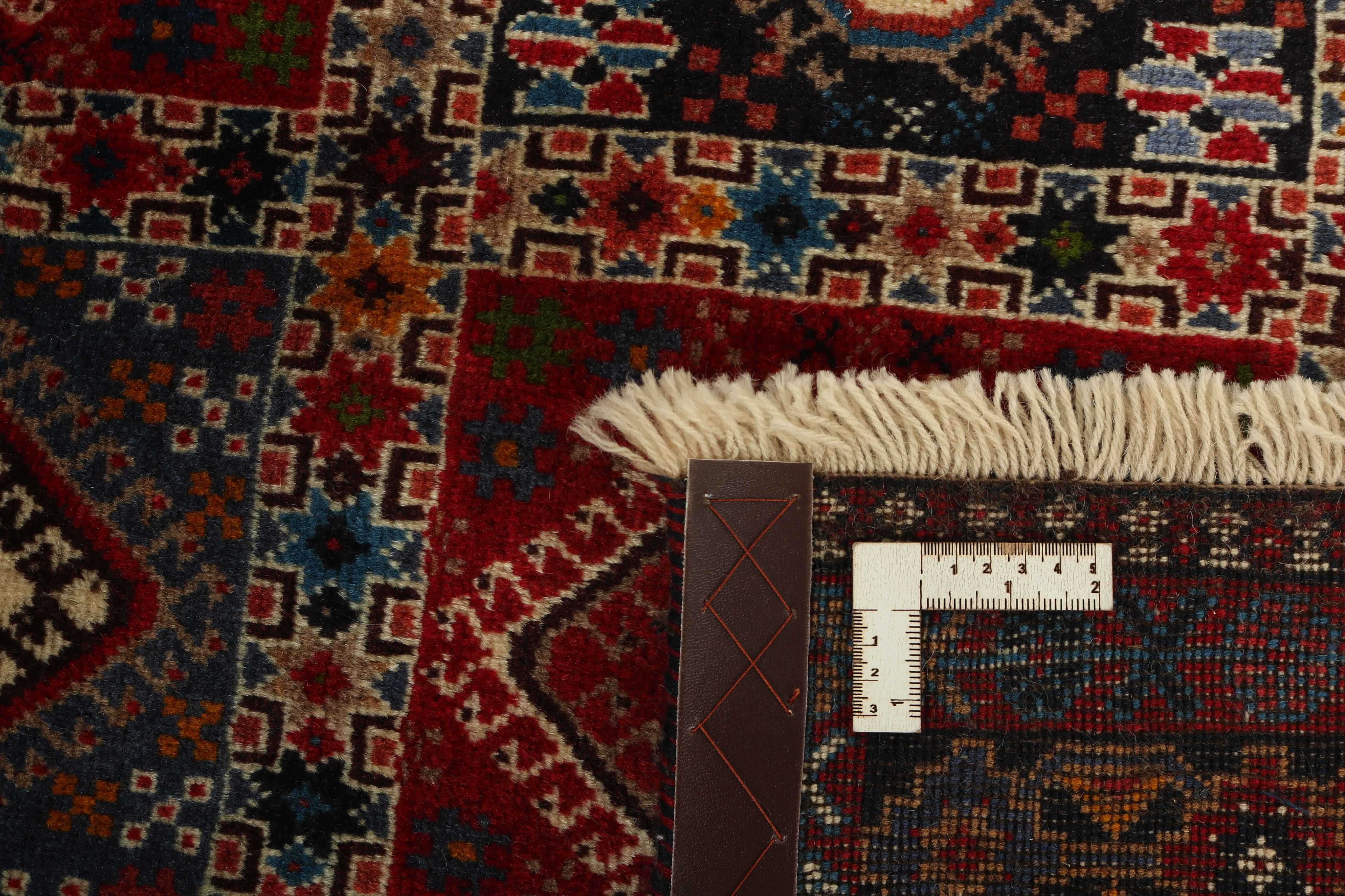 red authentic persian rug with a traditional design