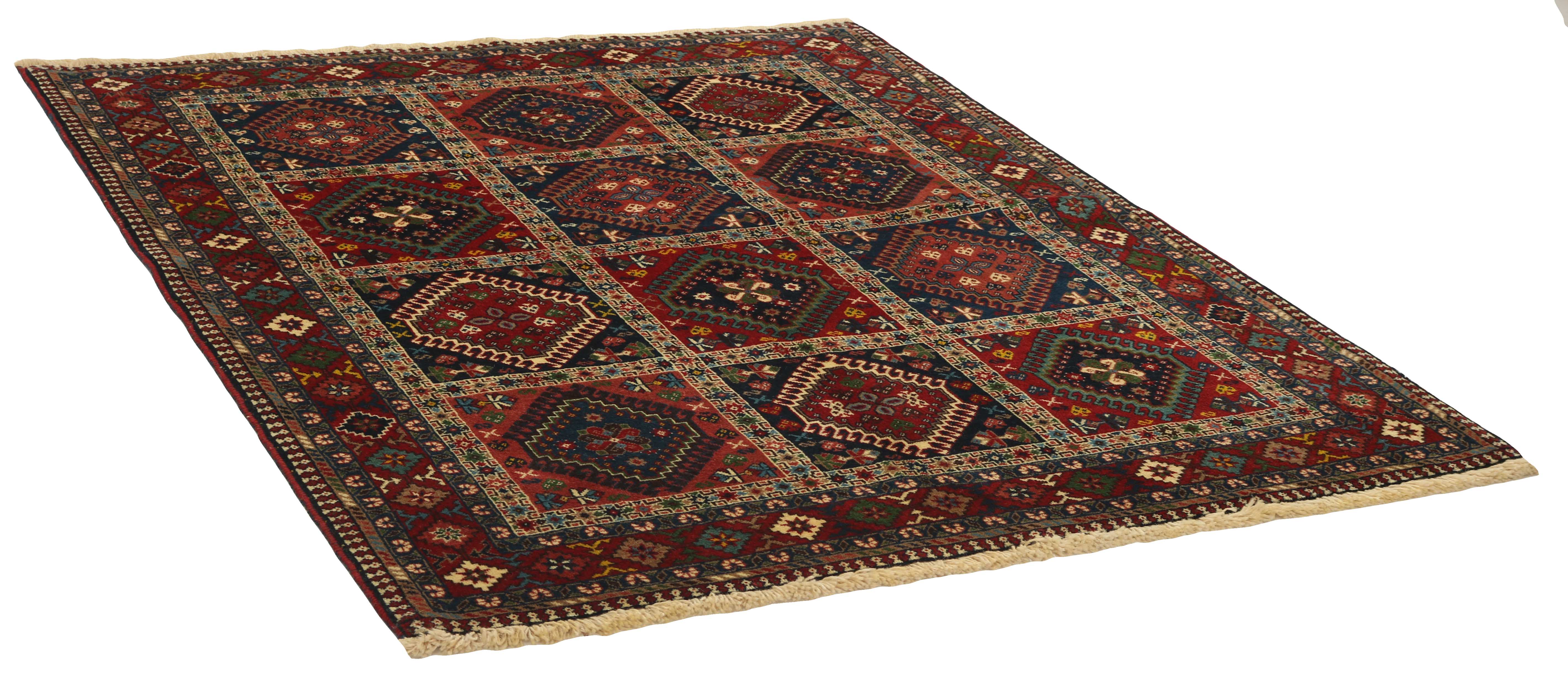 red authentic persian rug with a traditional design