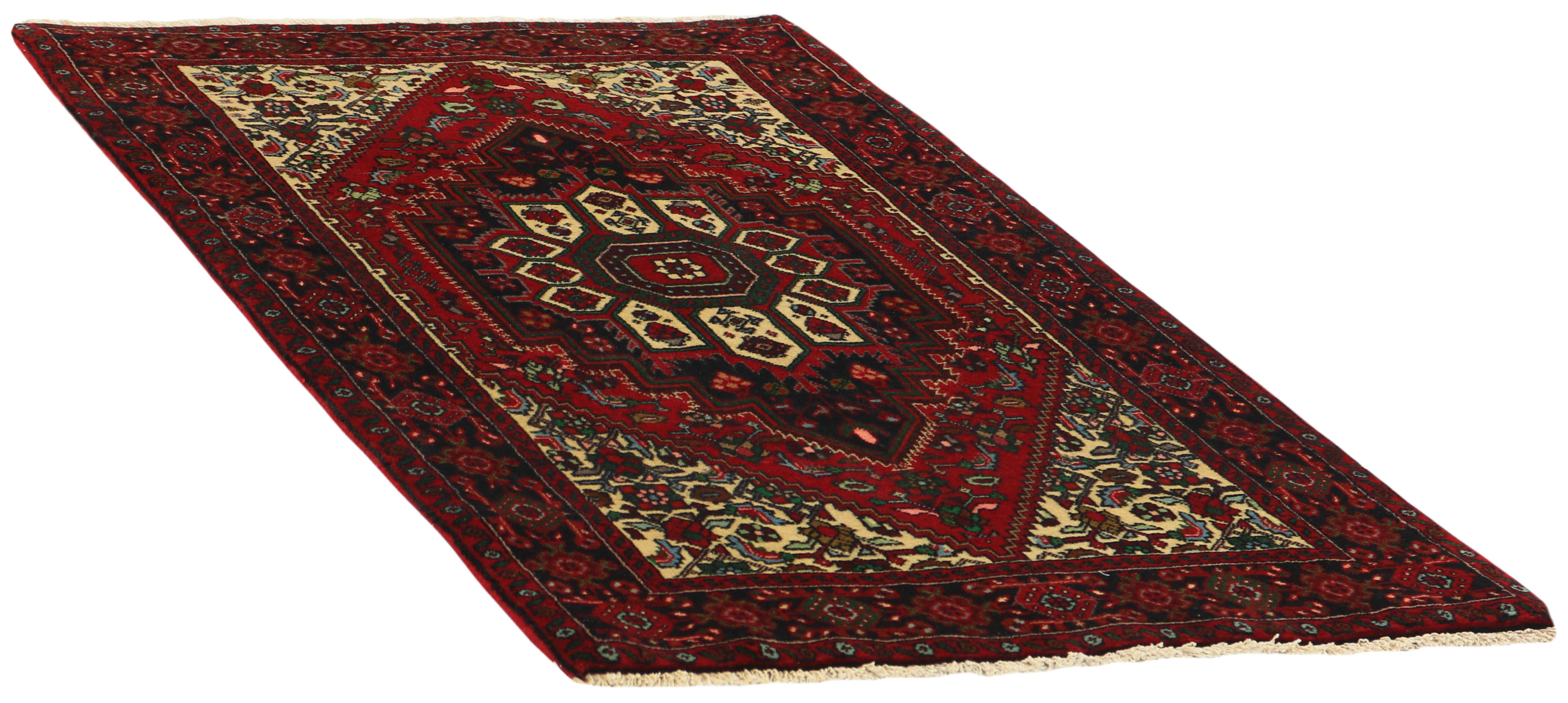 Red and beige persian rug with a floral design