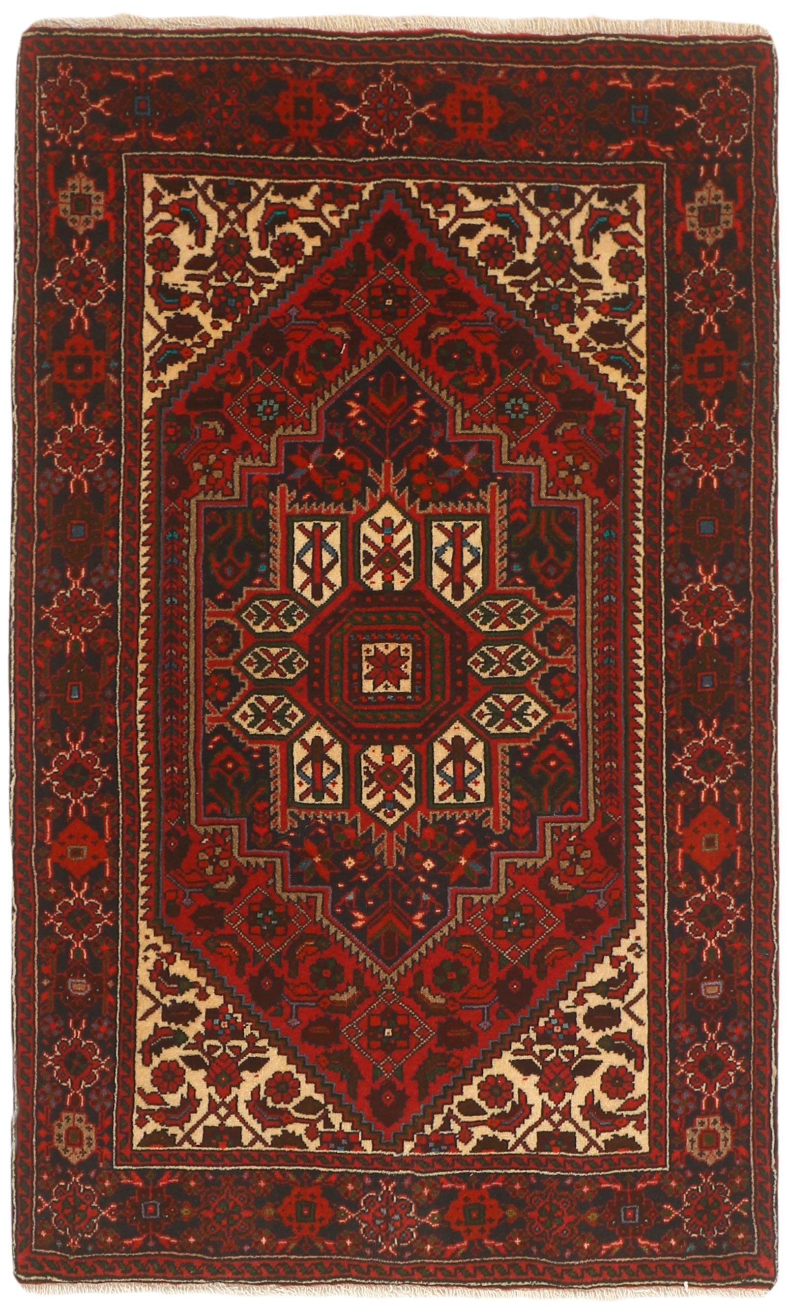 Red and beige persian rug with a floral design