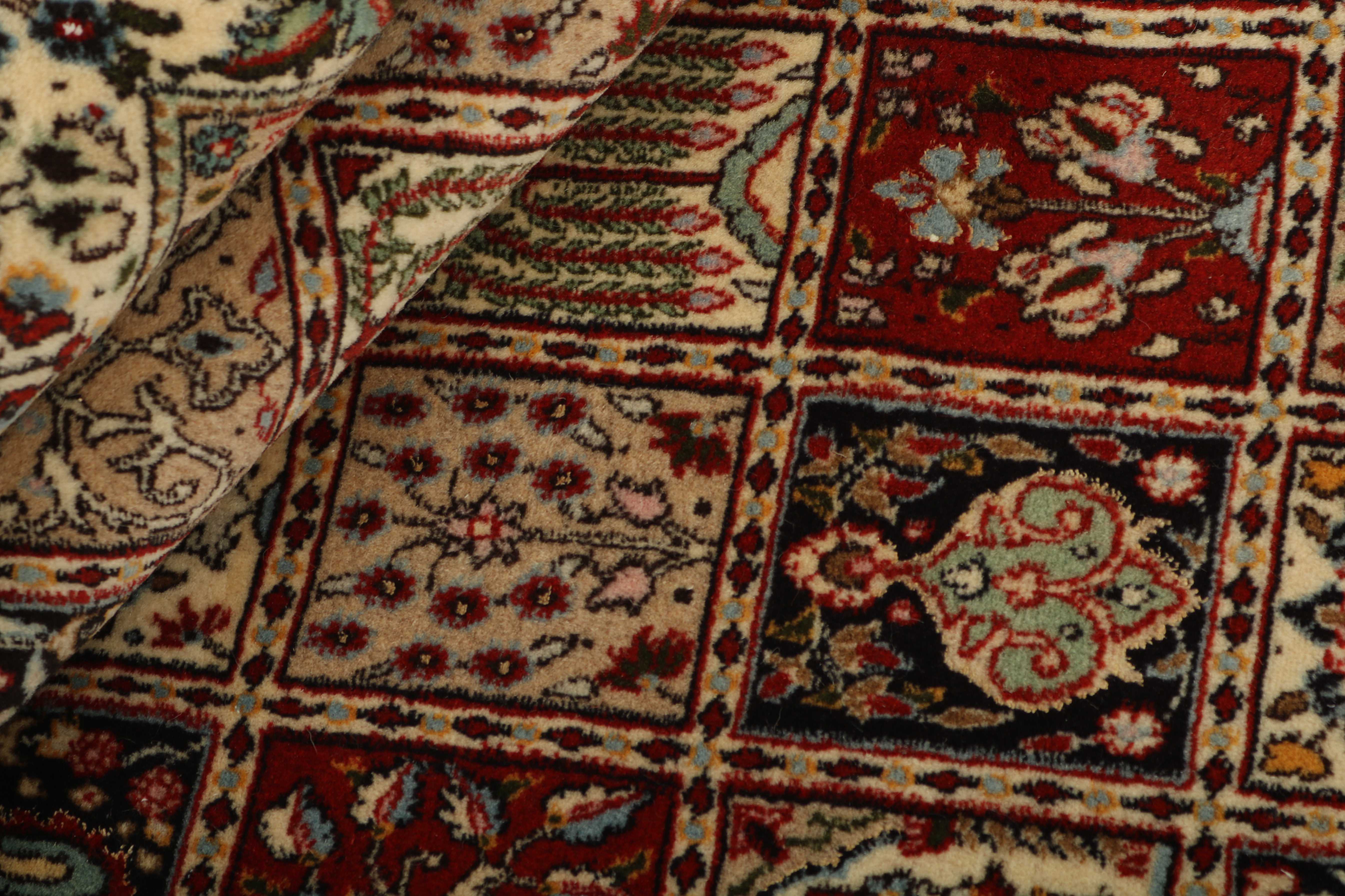 authentic persian rug with floral pattern in beige