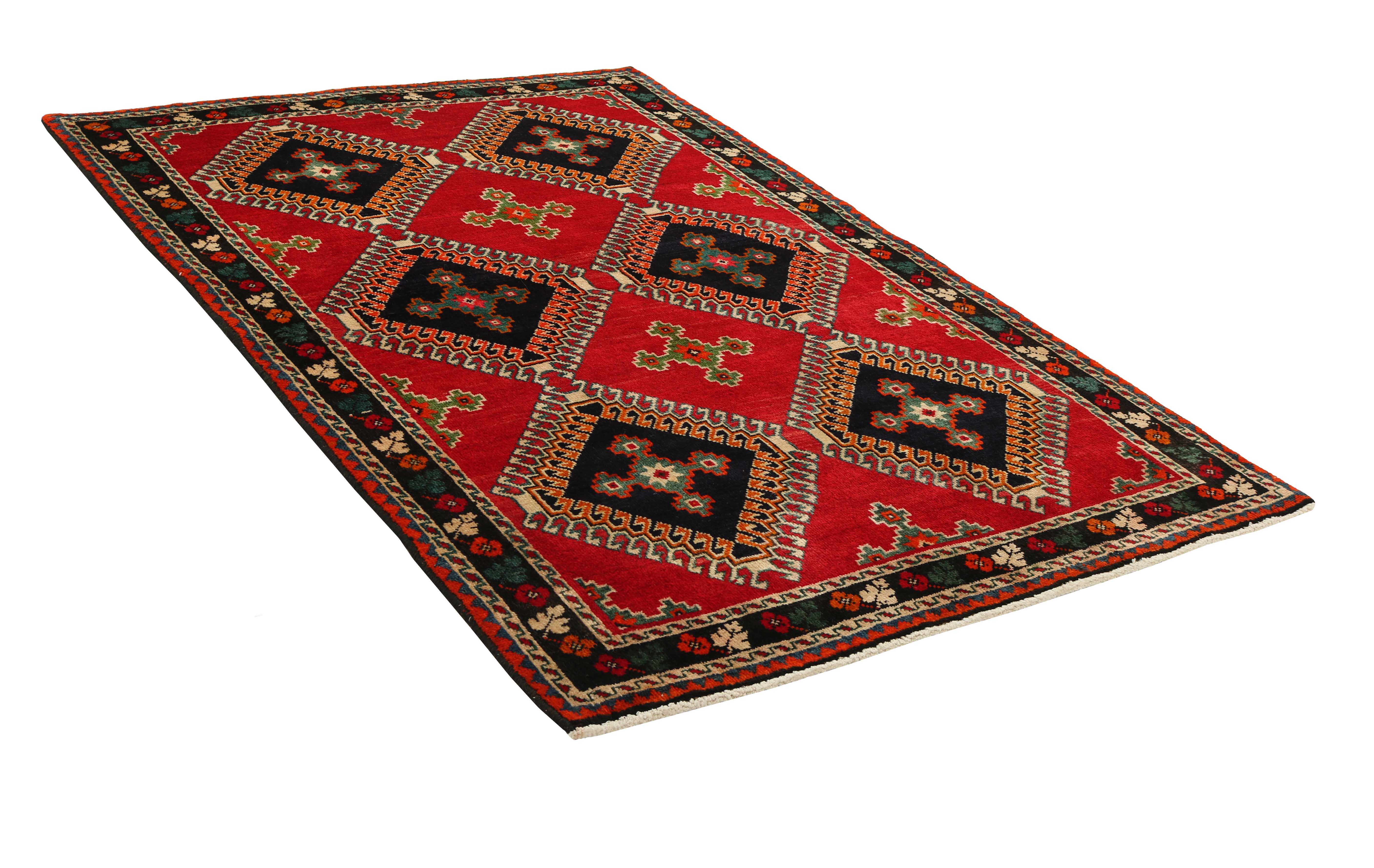 red and black persian rug with geometric design