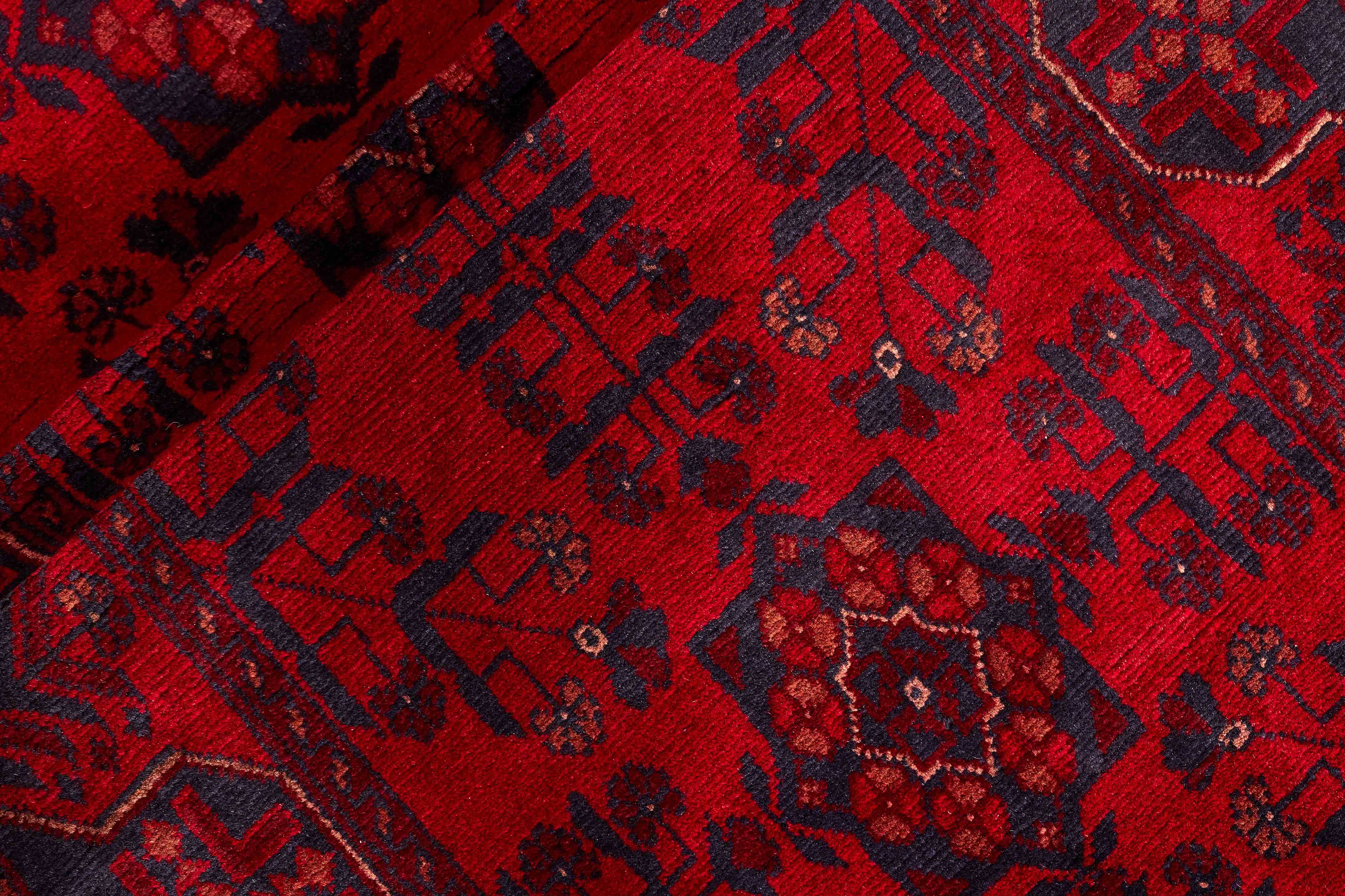 Authentic Oriental runner with traditional geometric tribal design in red