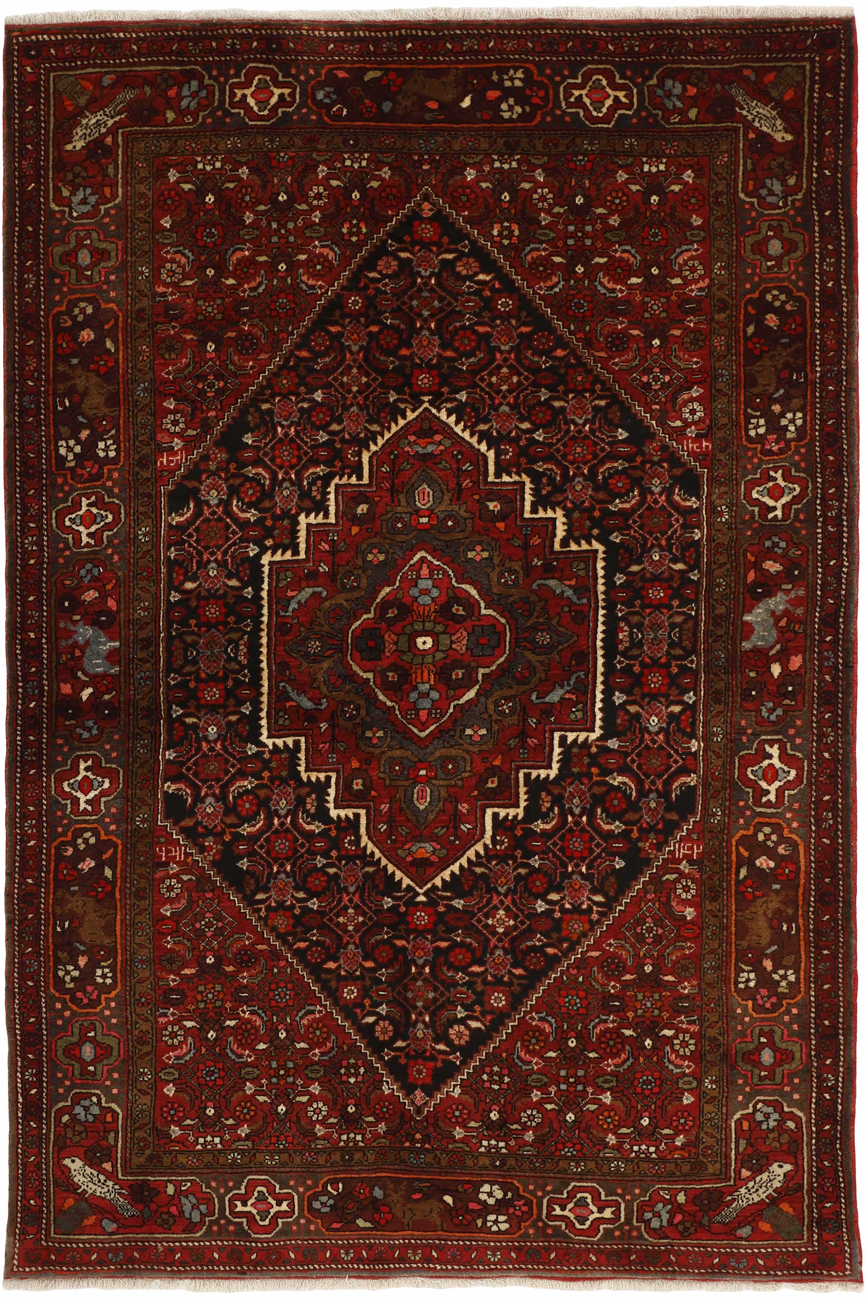 Red and beige persian rug with a floral design