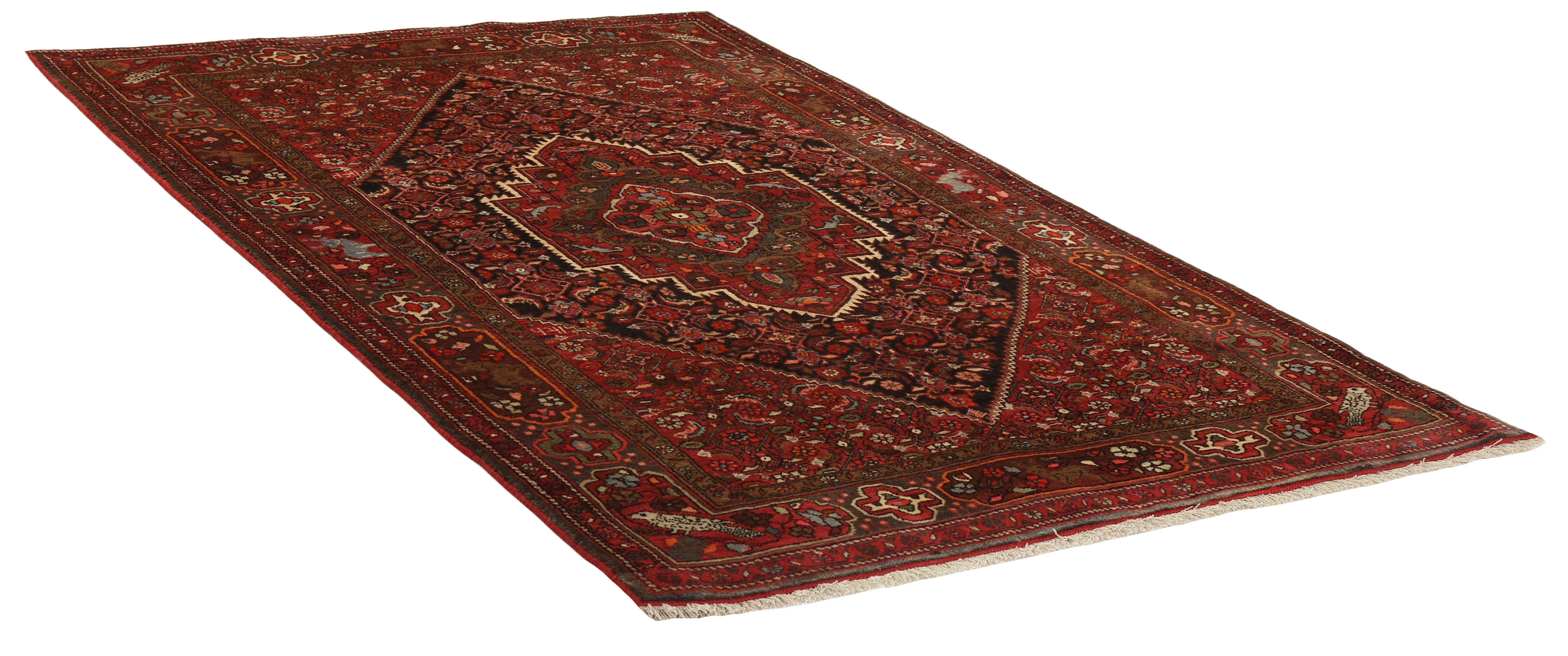 Red and beige persian rug with a floral design