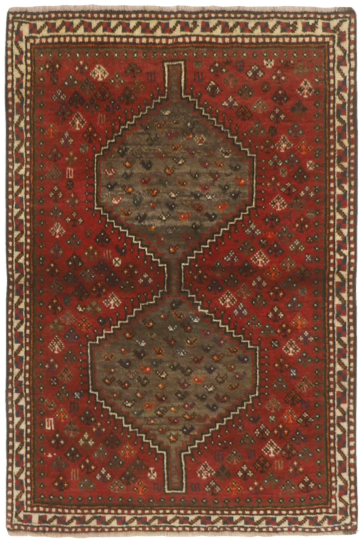Authentic persian rug with a traditional tribal geometric pattern in red