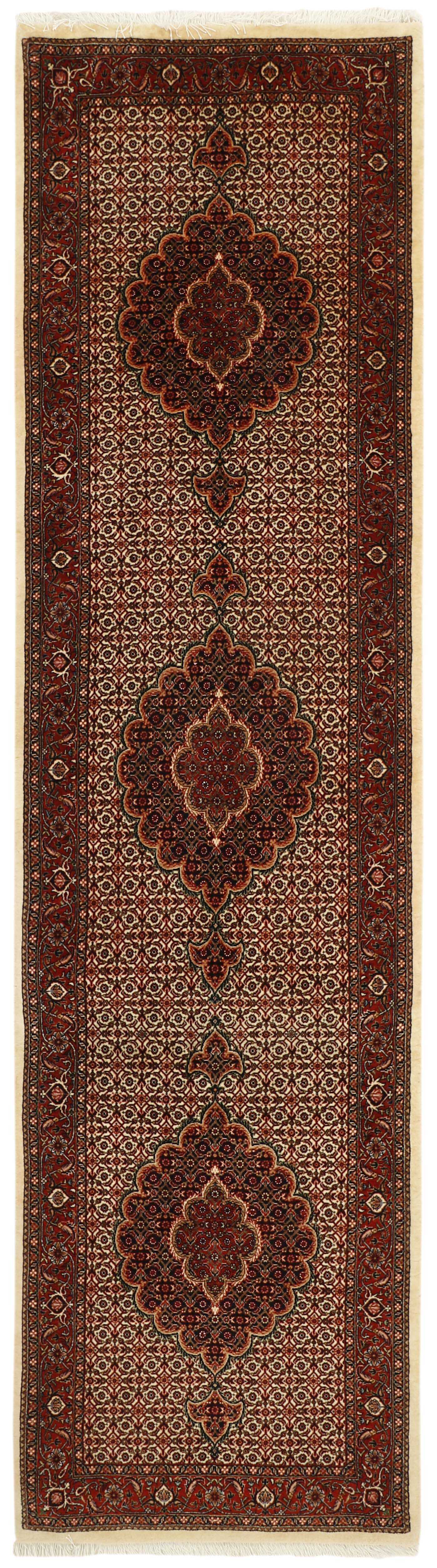 Red persian runner with traditional floral design