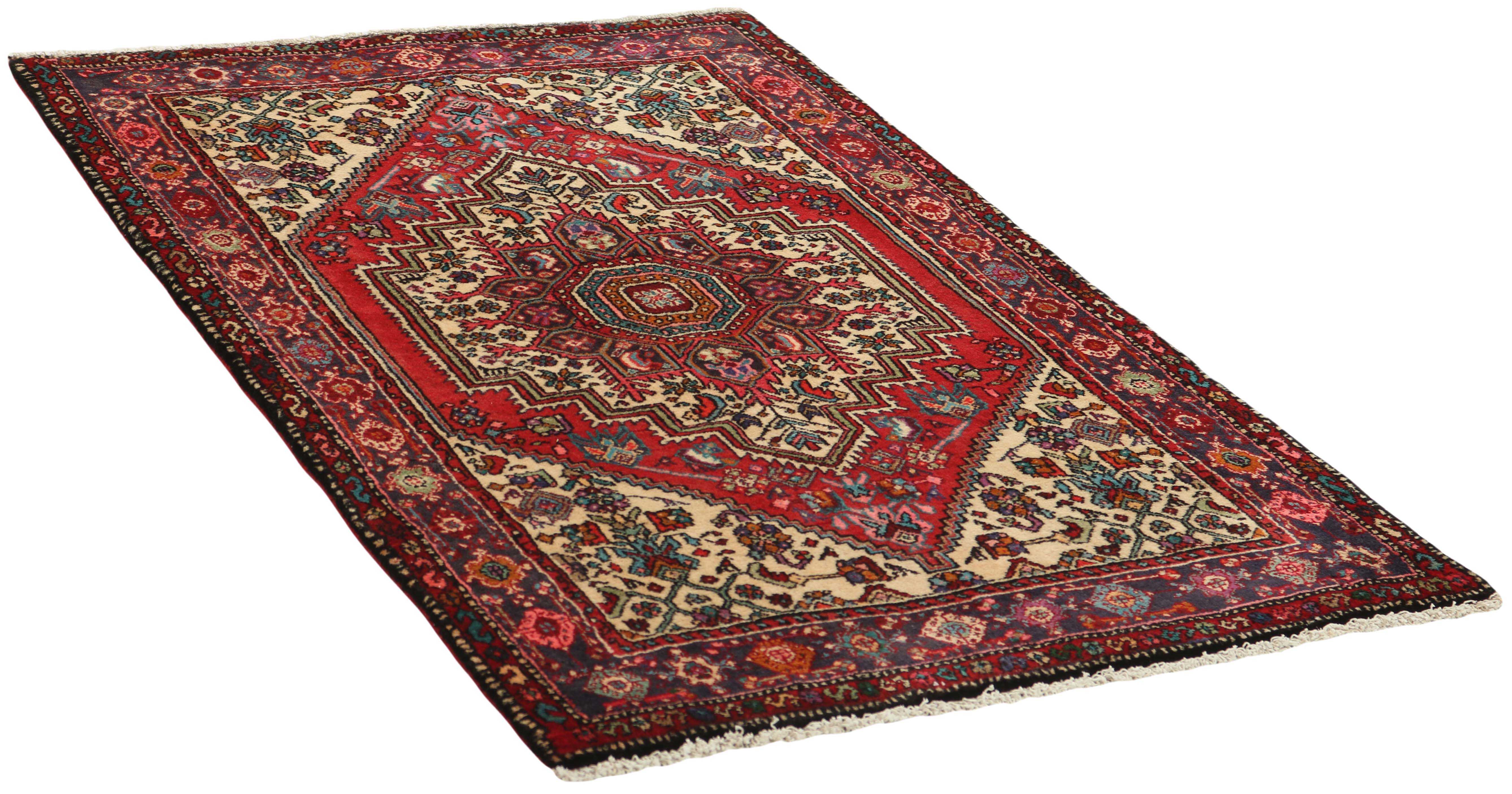 Red persian rug with a floral design